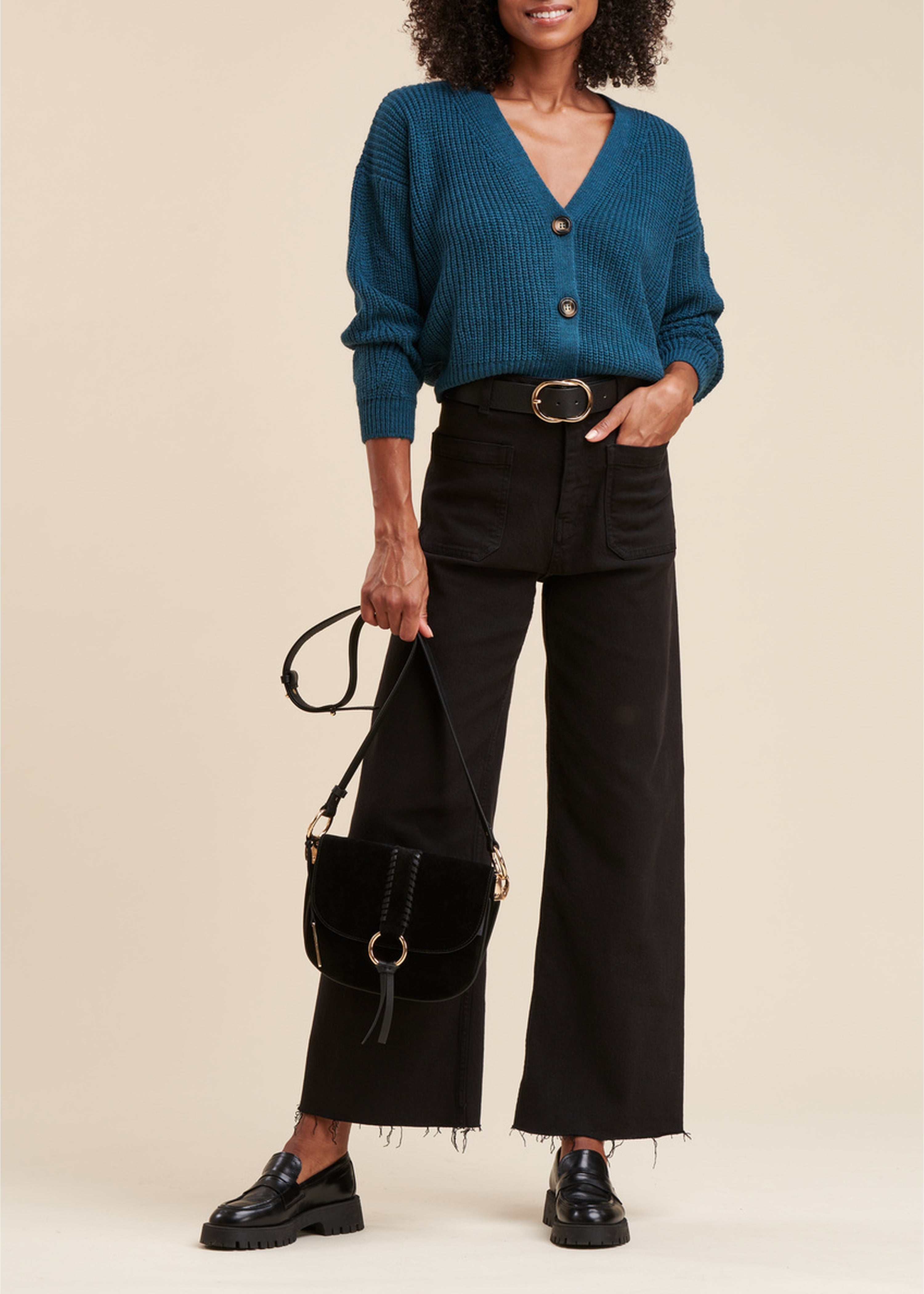 Cardigan corto in maglia a coste con perline