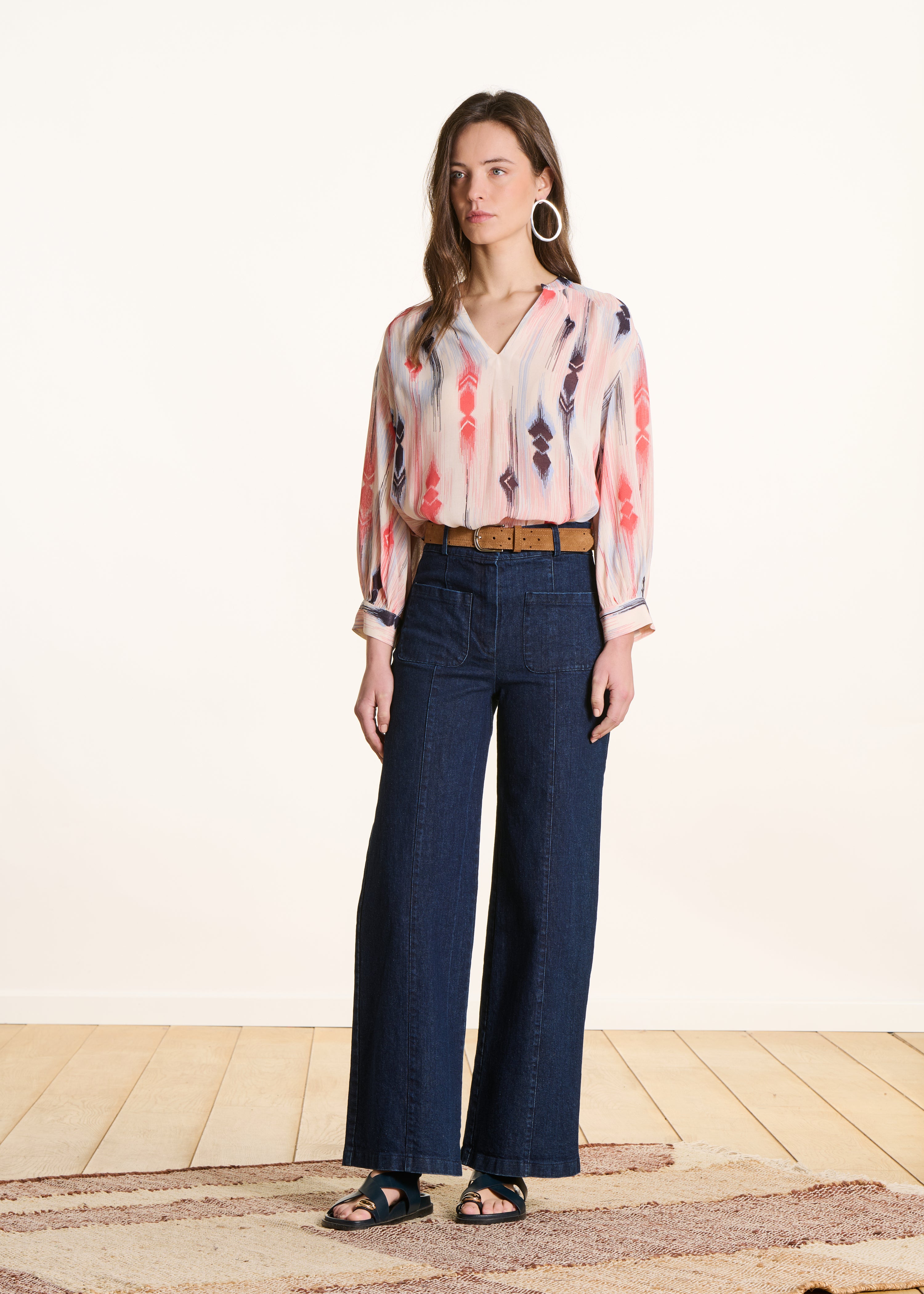 Jeans a vita alta a gamba larga e grezza