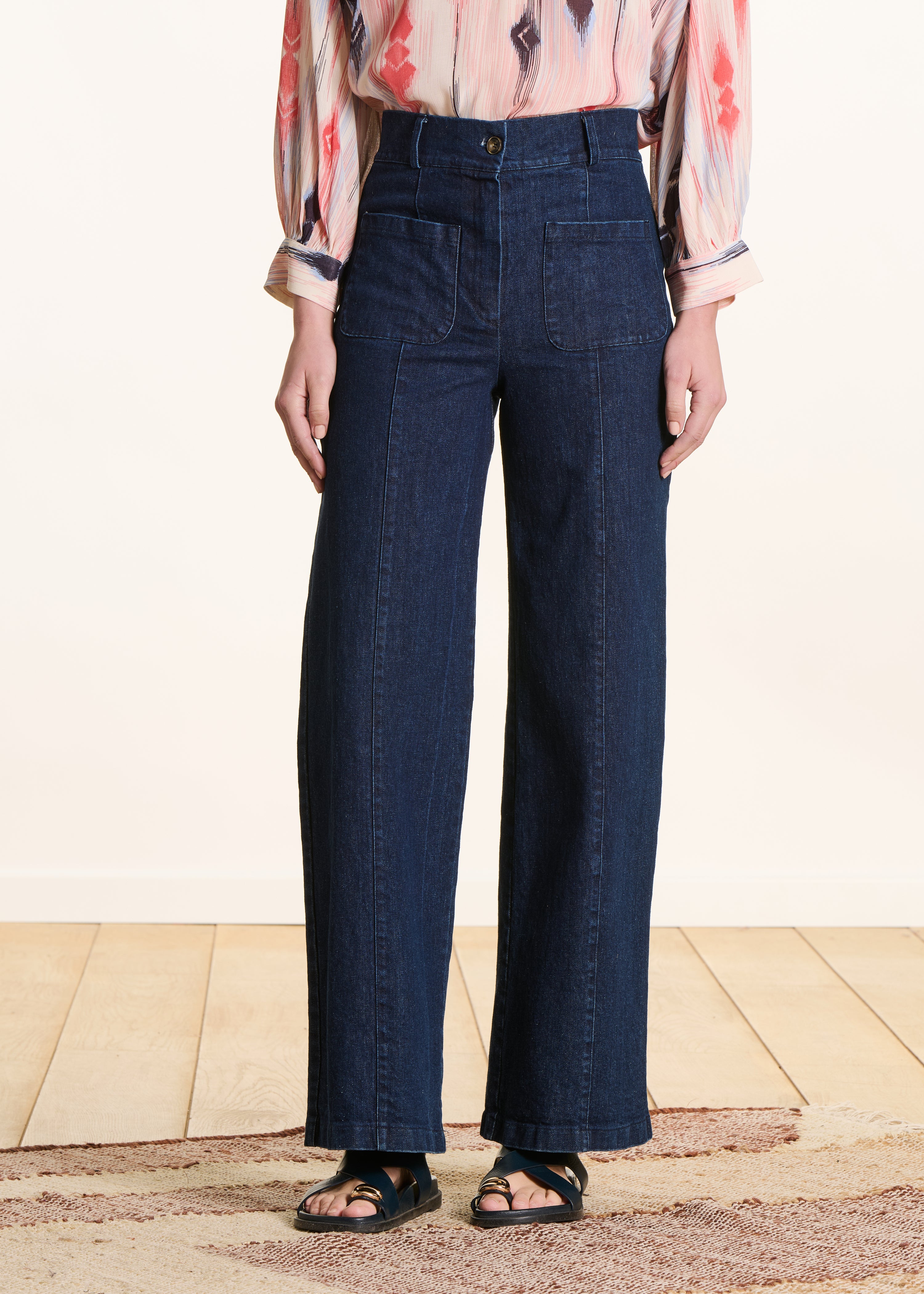 Jeans a vita alta a gamba larga e grezza