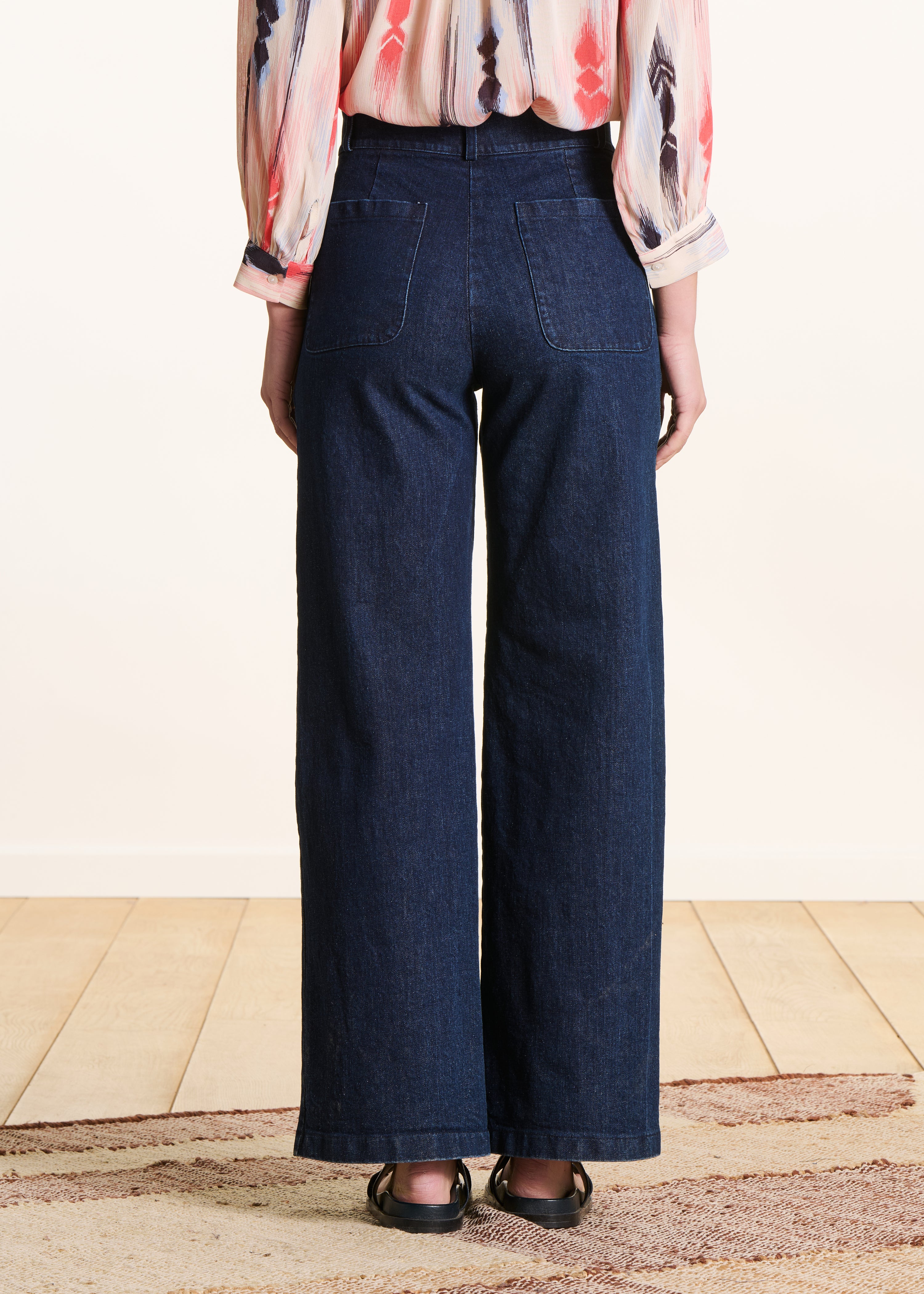 Jeans a vita alta a gamba larga e grezza