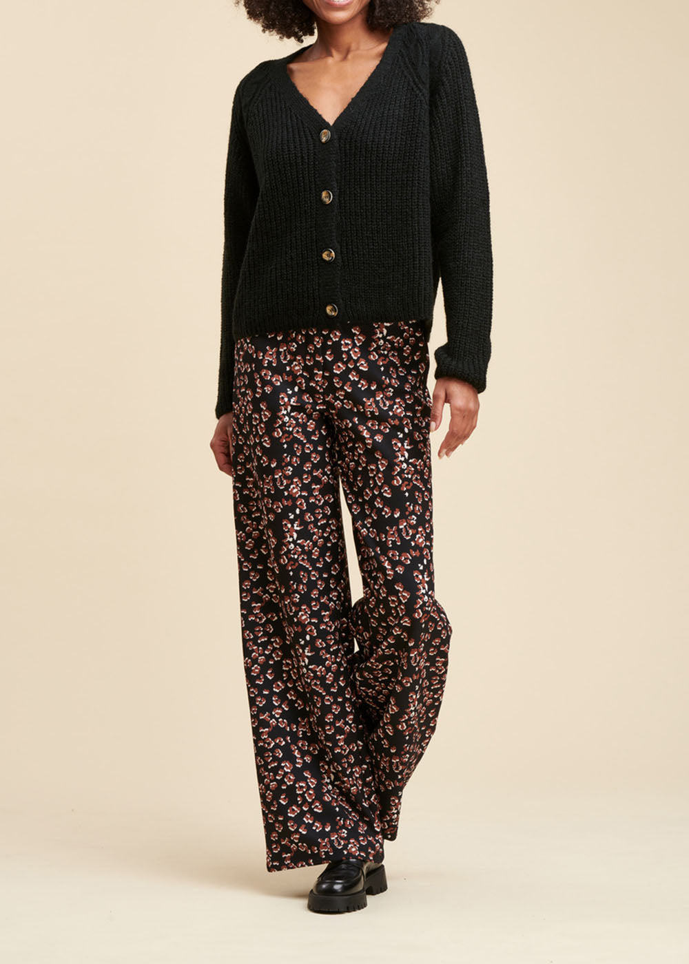Cardigan scintillante con scollo a V