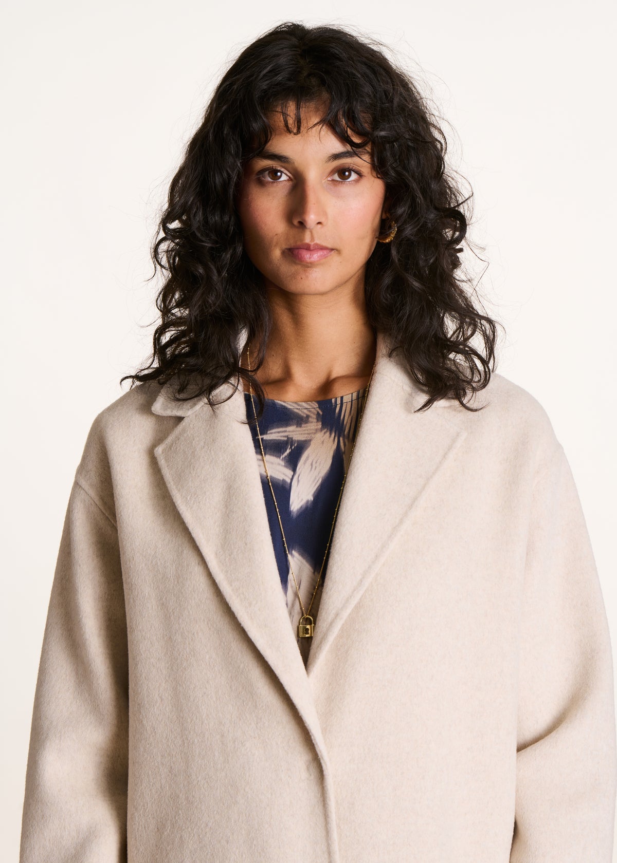 Mid-length ecru wool coat
