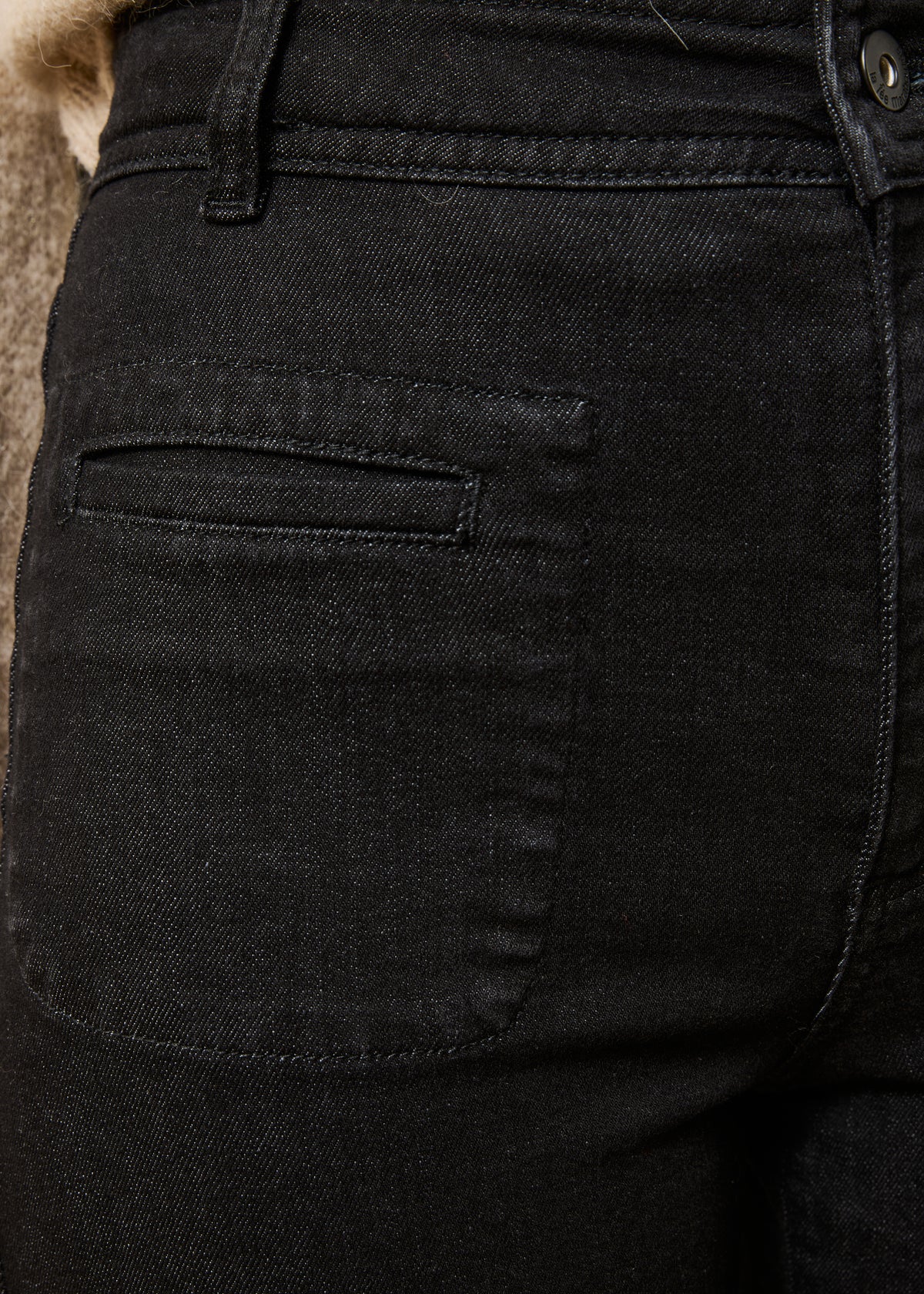 Calças de ganga bootcut preto de cintura alta em algodão biológico