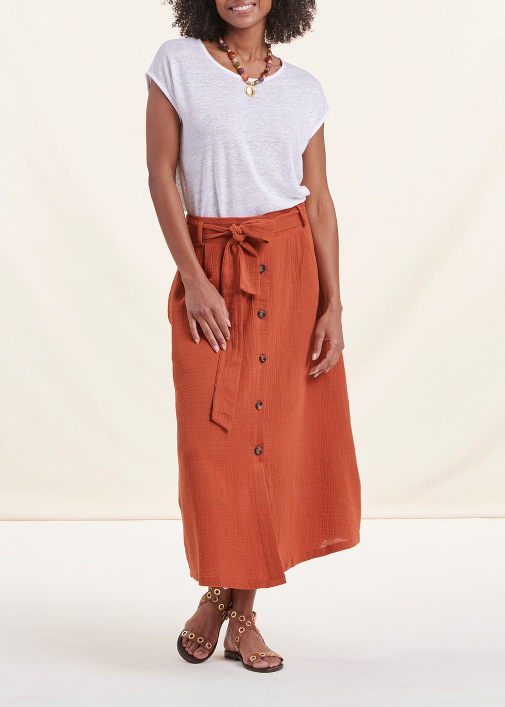 Orange buttoned cotton mid-length skirt