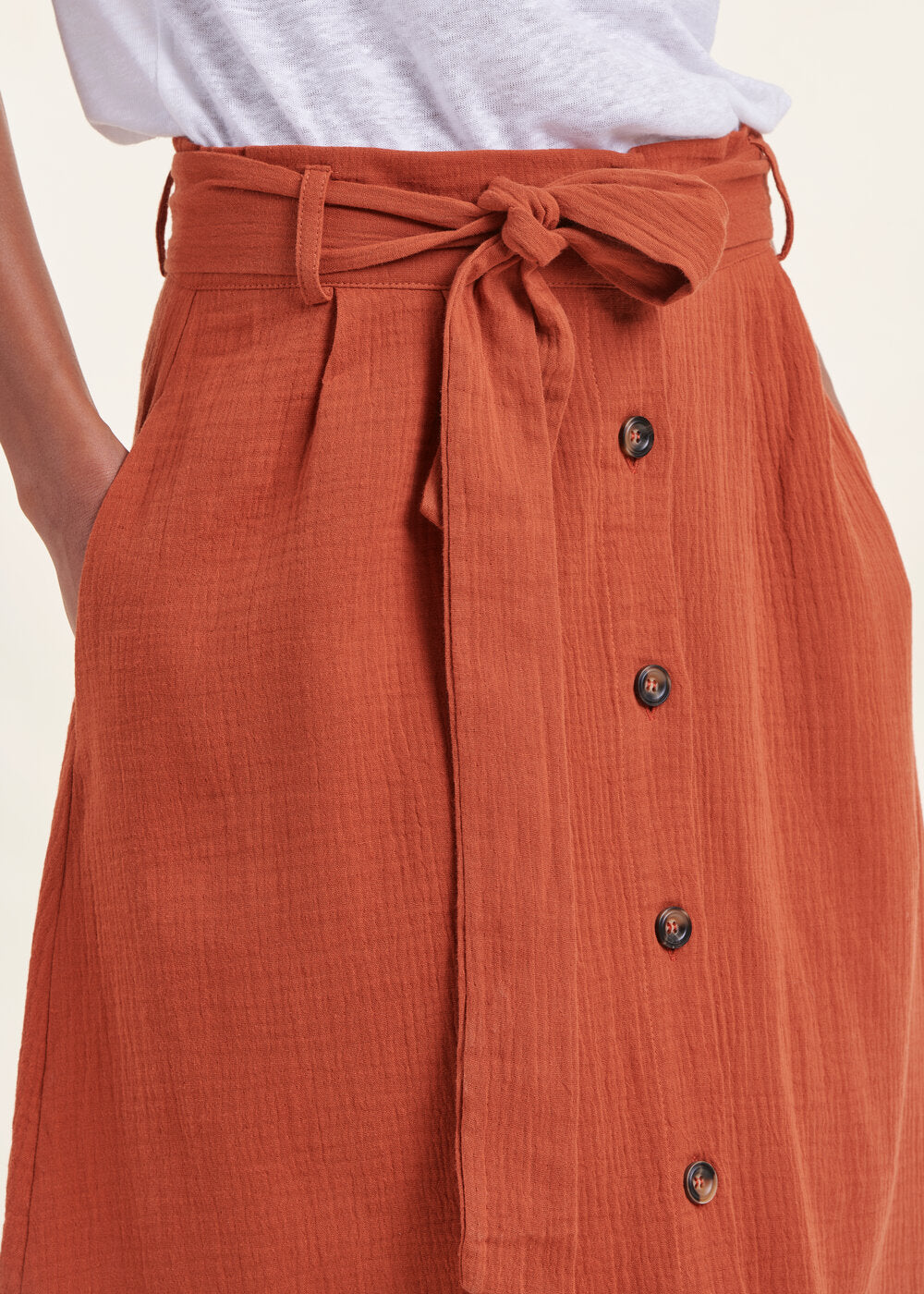 Orange buttoned cotton mid-length skirt