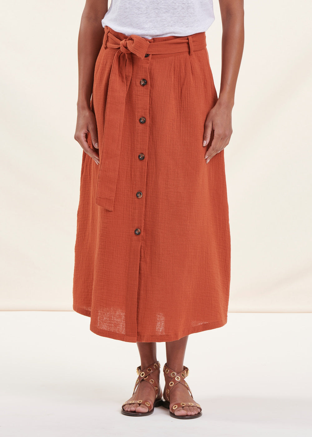 Orange buttoned cotton mid-length skirt