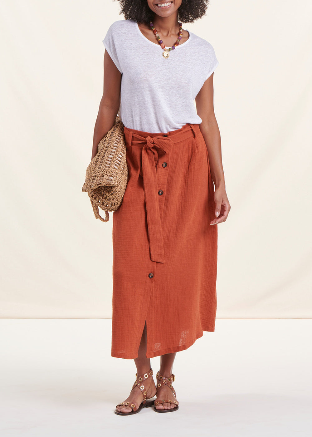 Orange buttoned cotton mid-length skirt