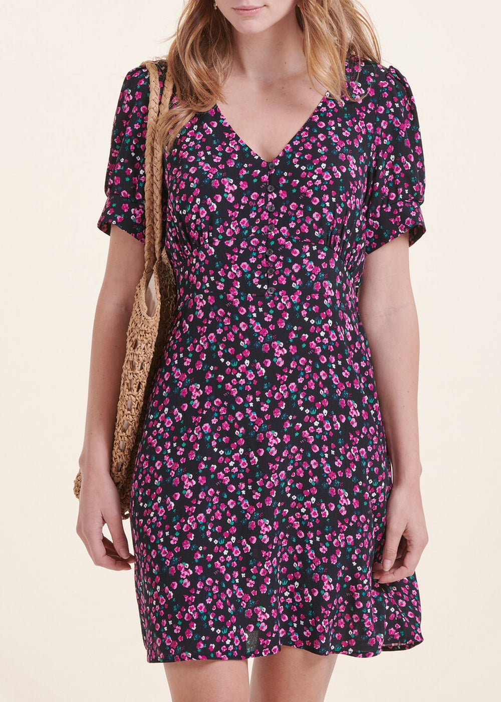 Short black fitted floral dress with short sleeves