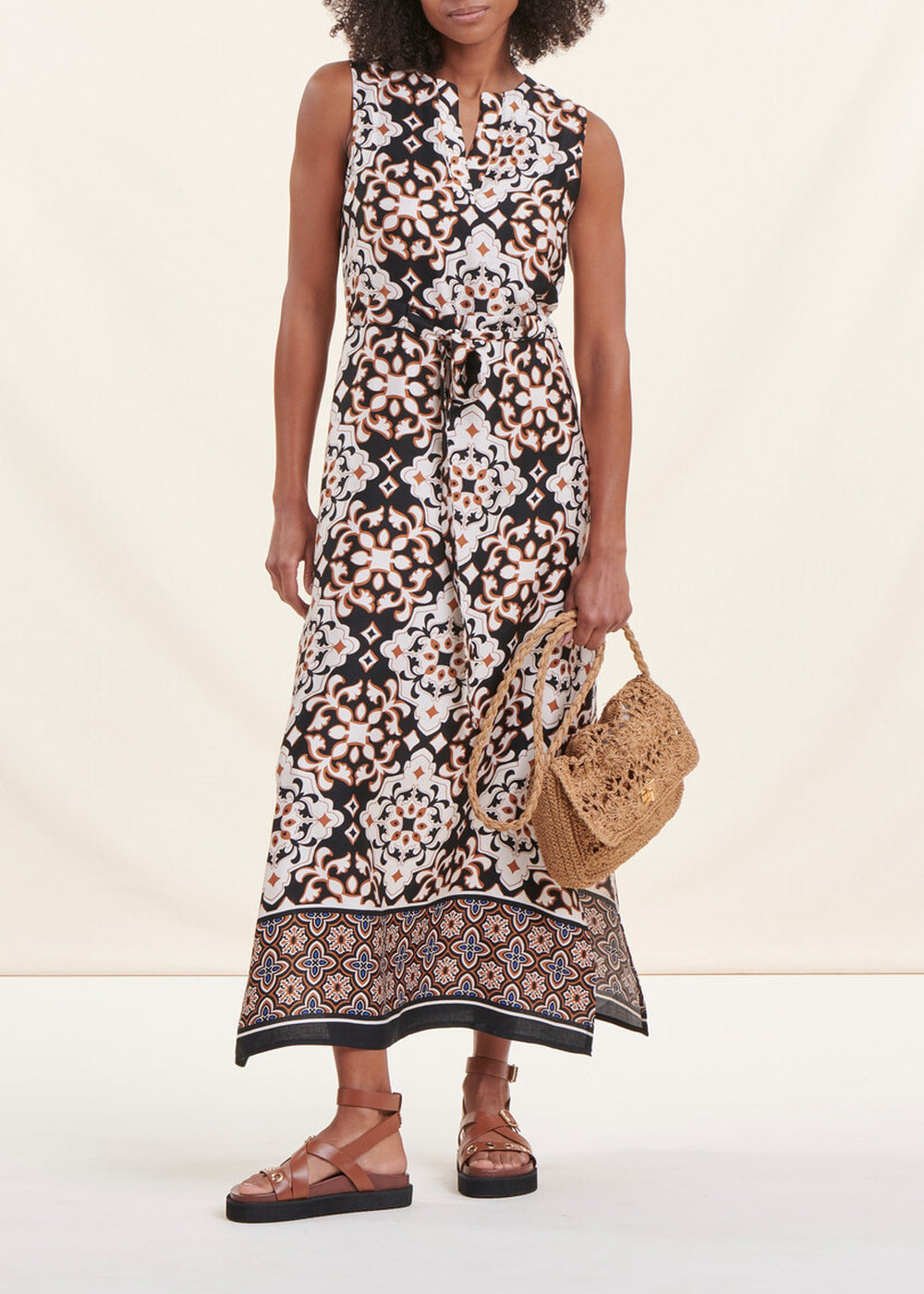 Sleeveless satin maxi dress with ethnic print