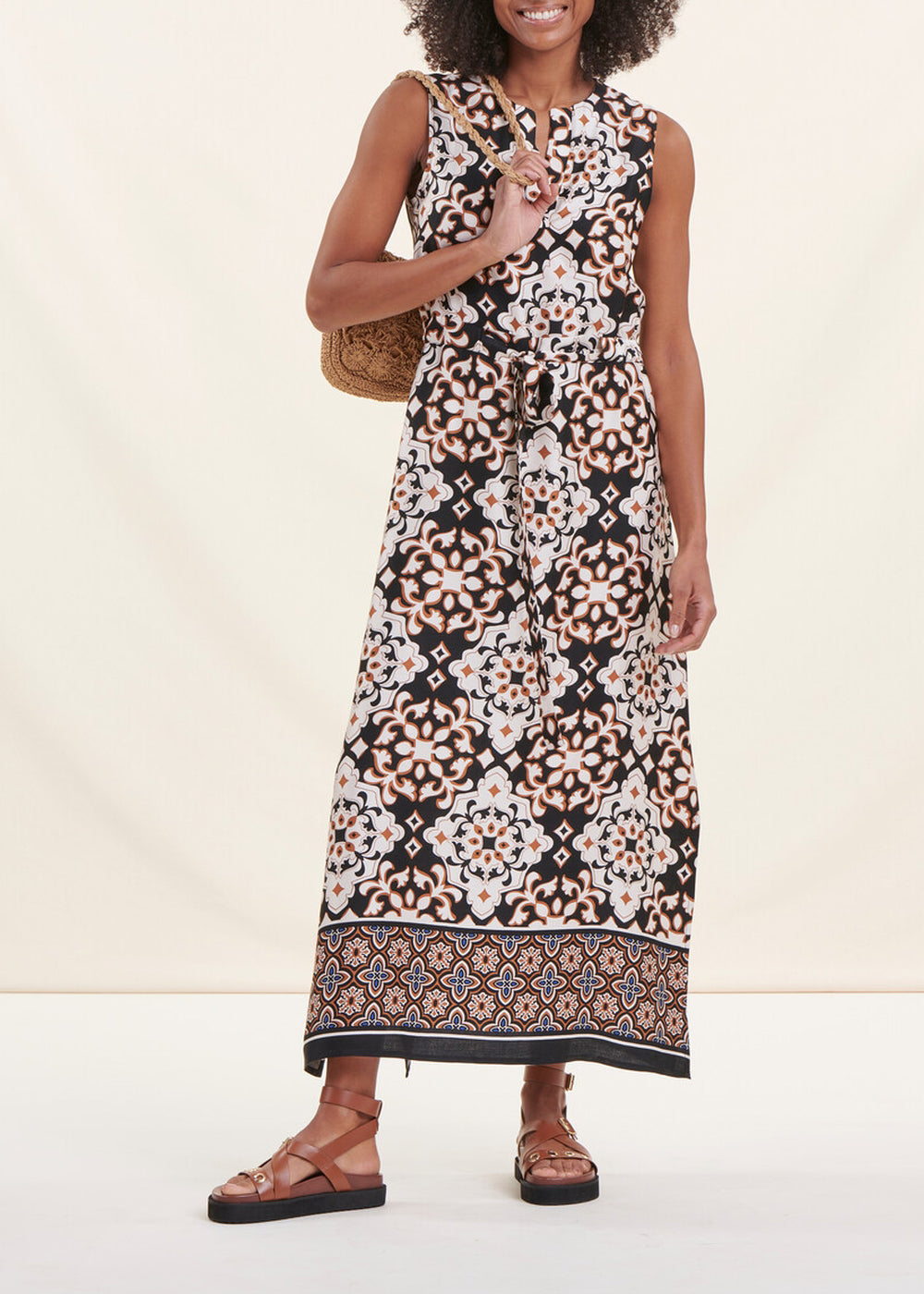 Sleeveless satin maxi dress with ethnic print