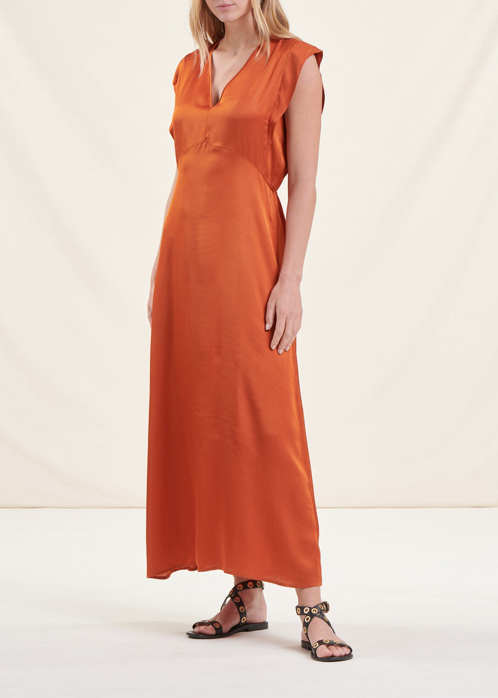 Long flowing cognac fitted satin dress