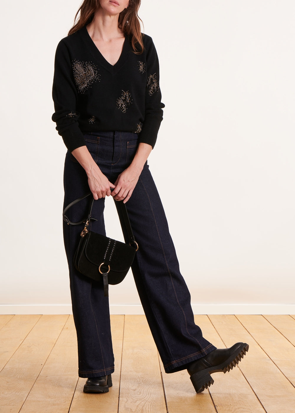 black sequined V-neck sweater