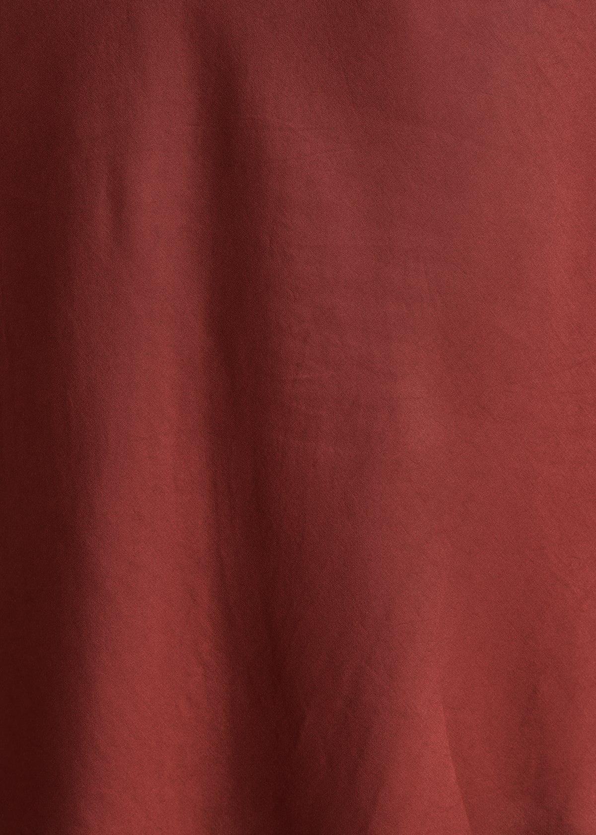 Long flowing burgundy fitted dress with short sleeves