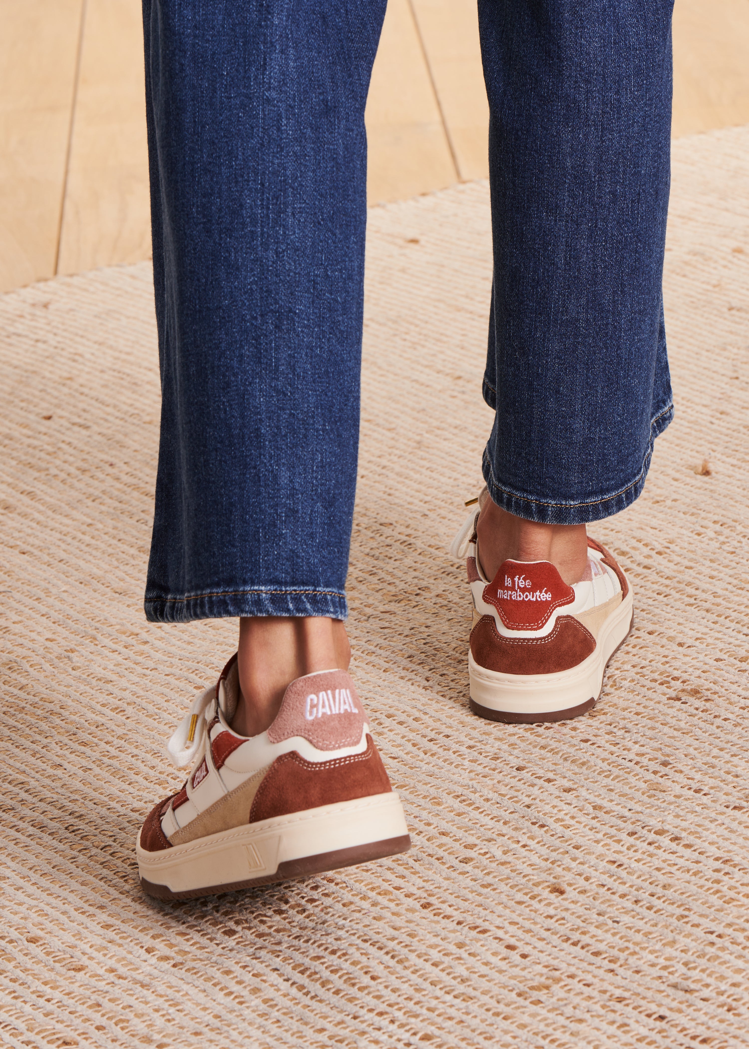 Red asymmetric trainers