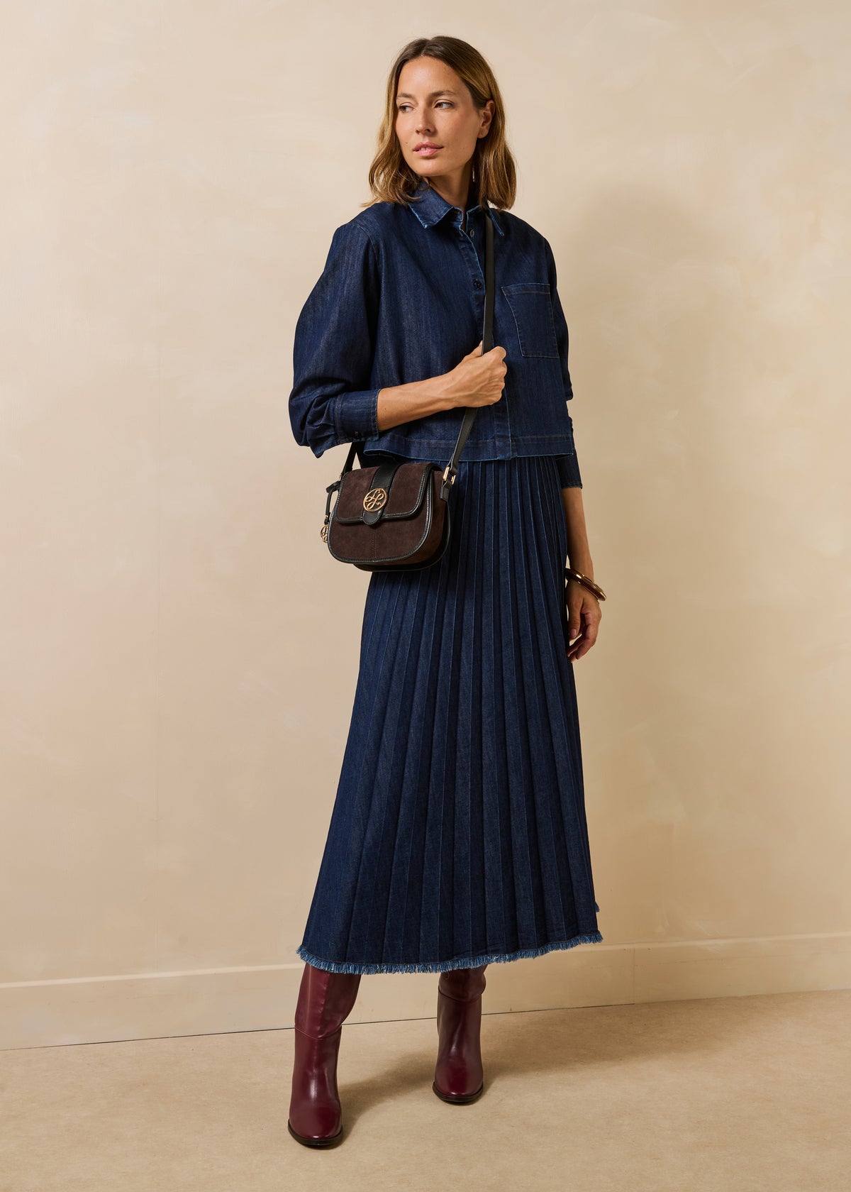 Long pleated skirt in raw denim