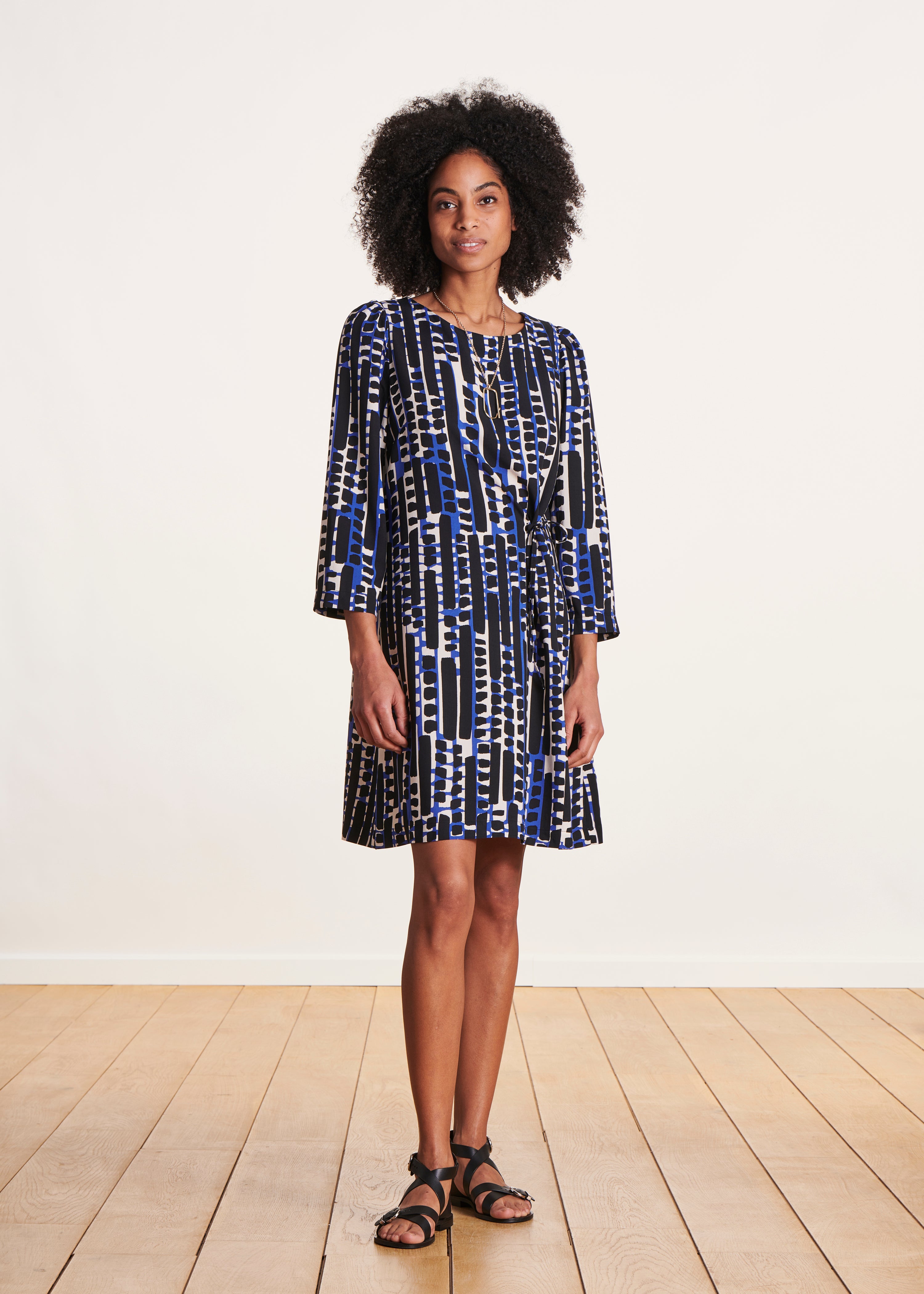Short blue dress with 3/4 length sleeves La Fée Maraboutée