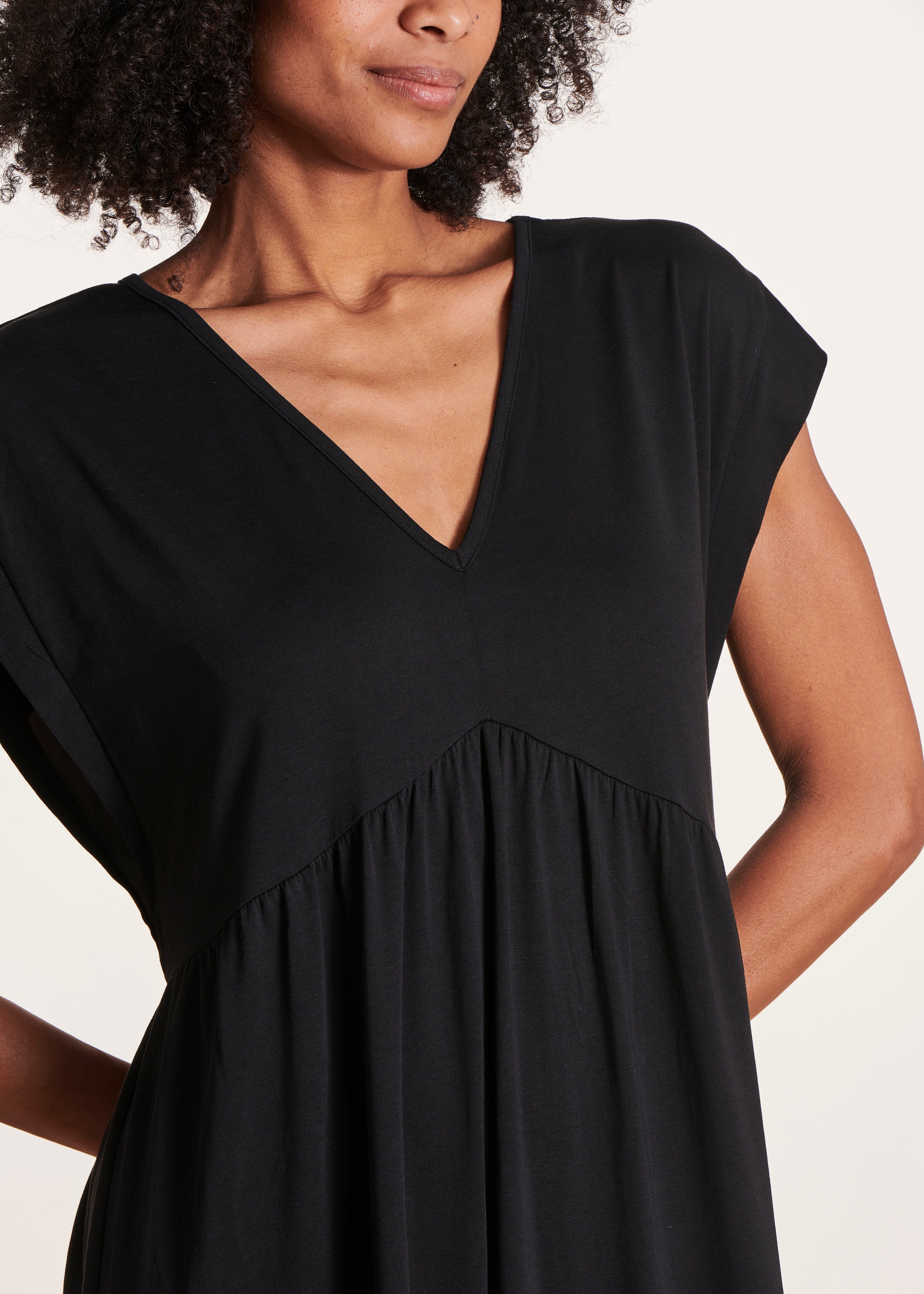 Black fluid midi dress with V-neck in lyocell