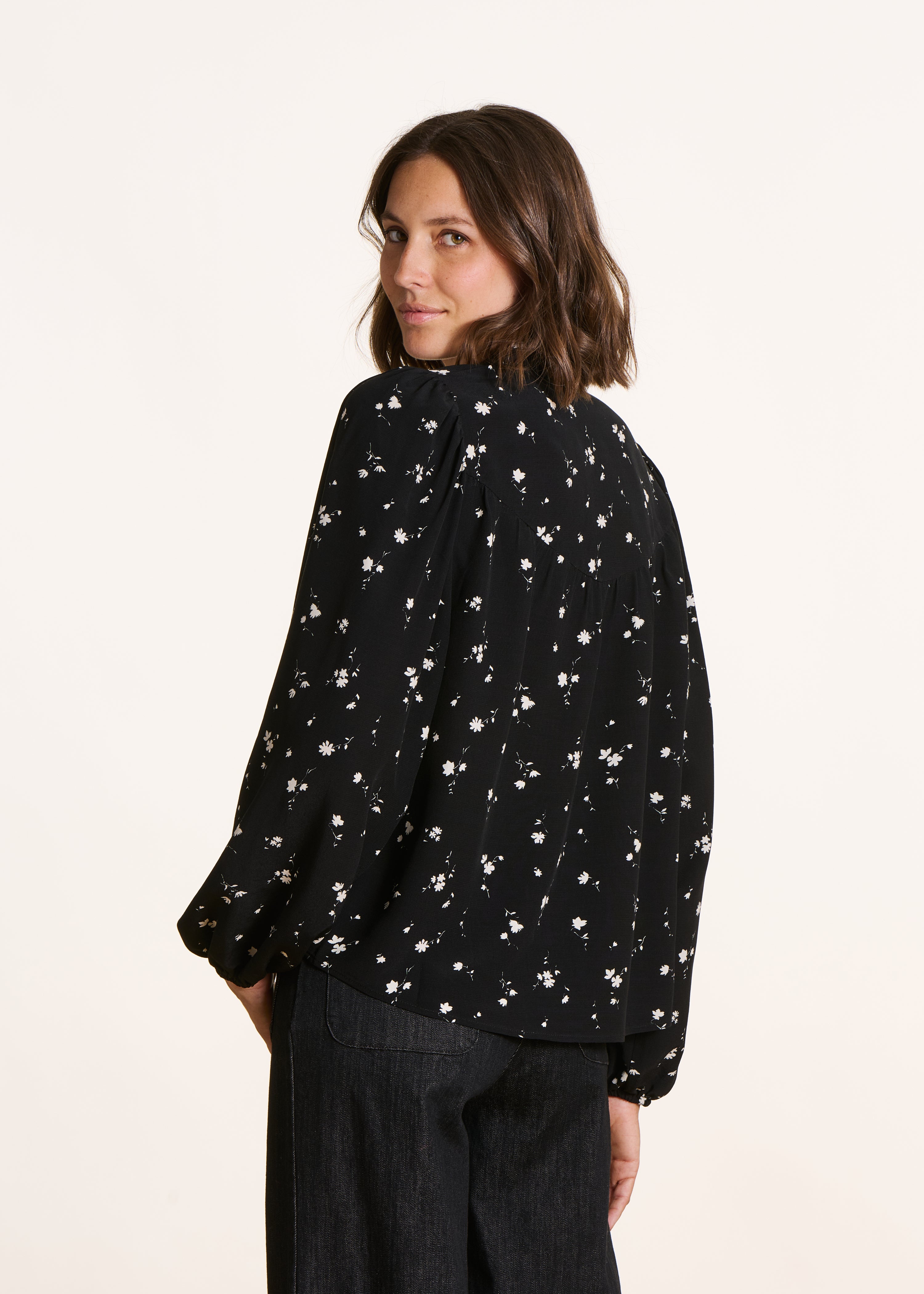 Loose black and white shirt with floral print