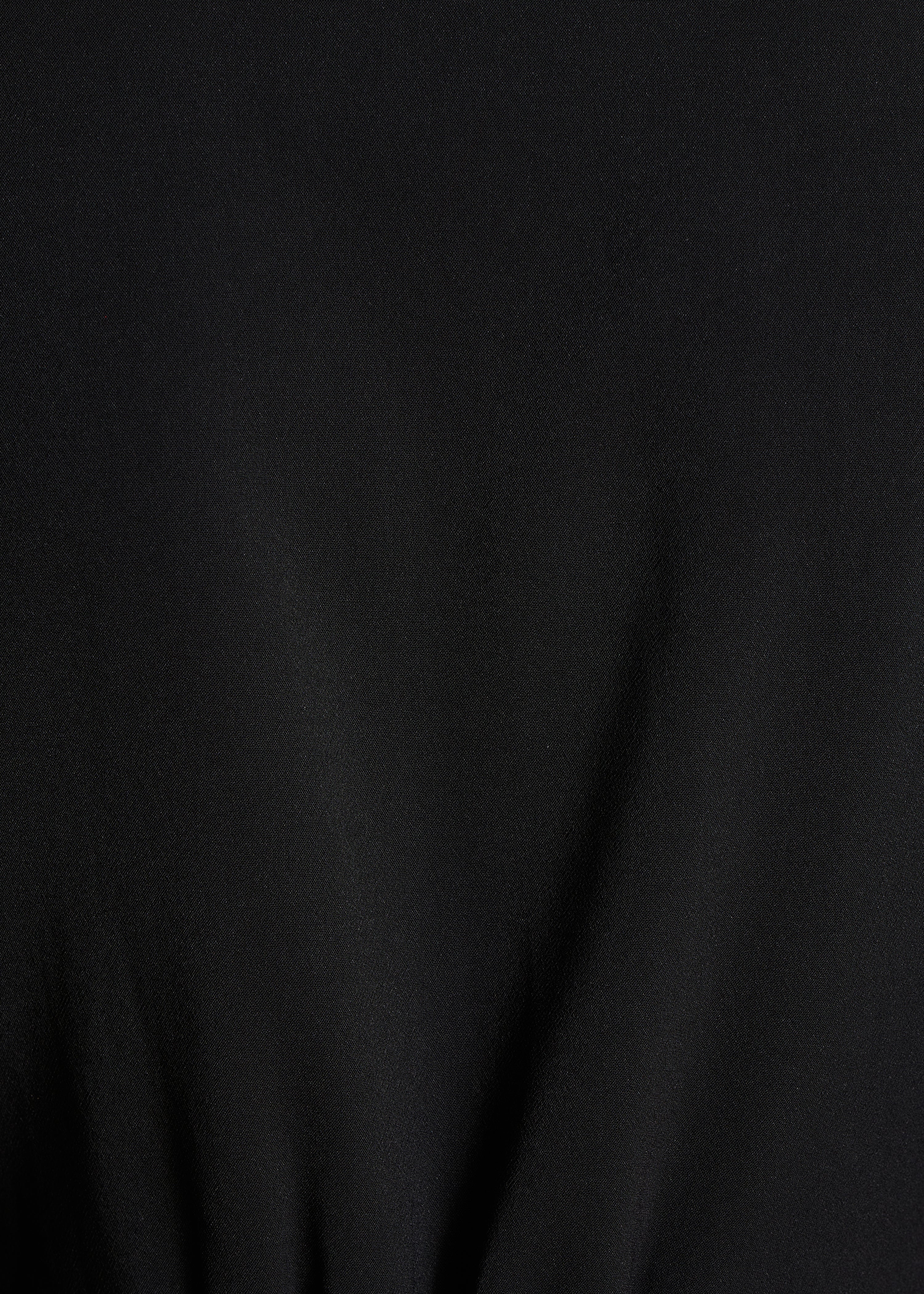 Black long-sleeved jumpsuit with shirt collar