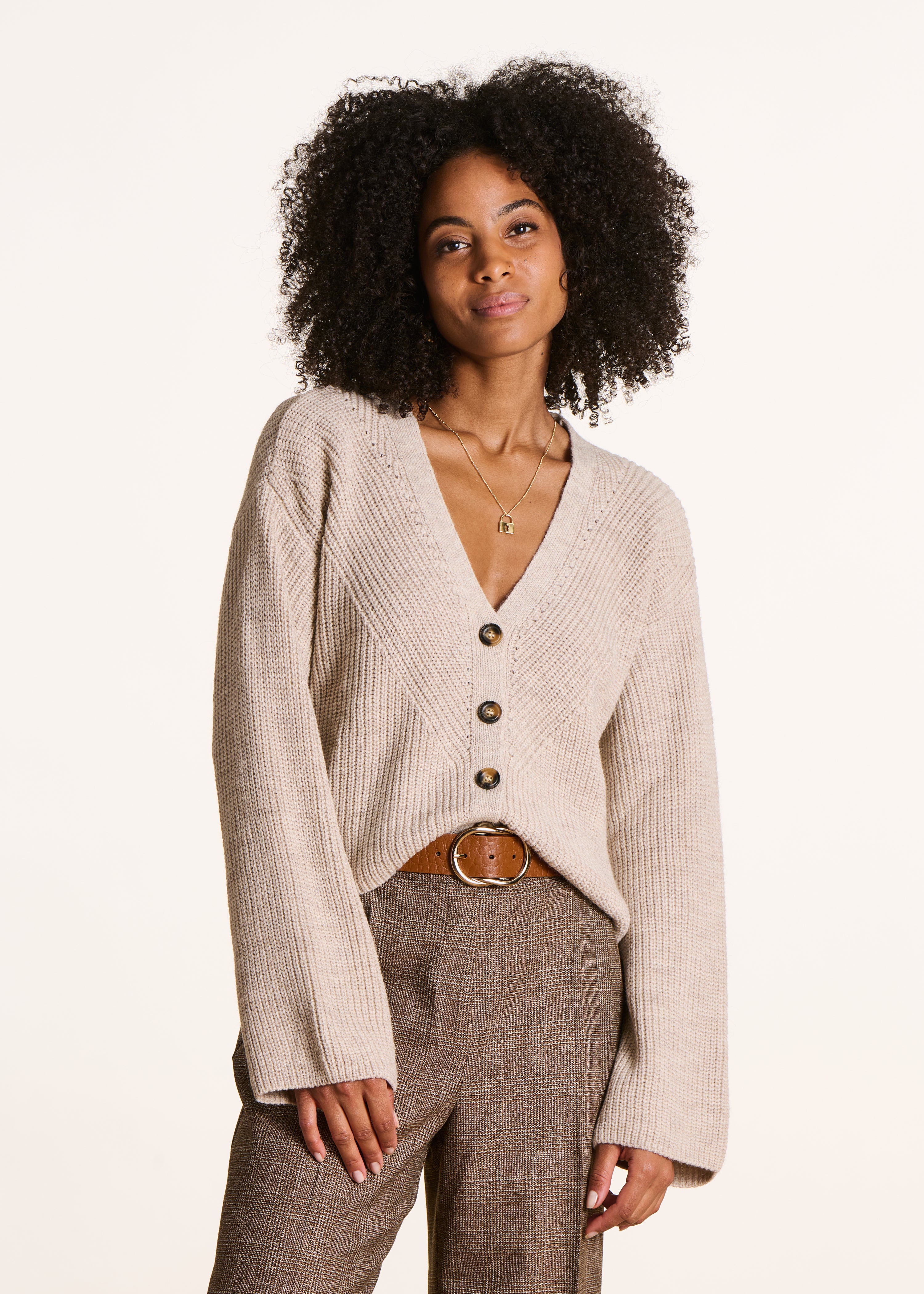 Gilet court beige en côtes perlées
