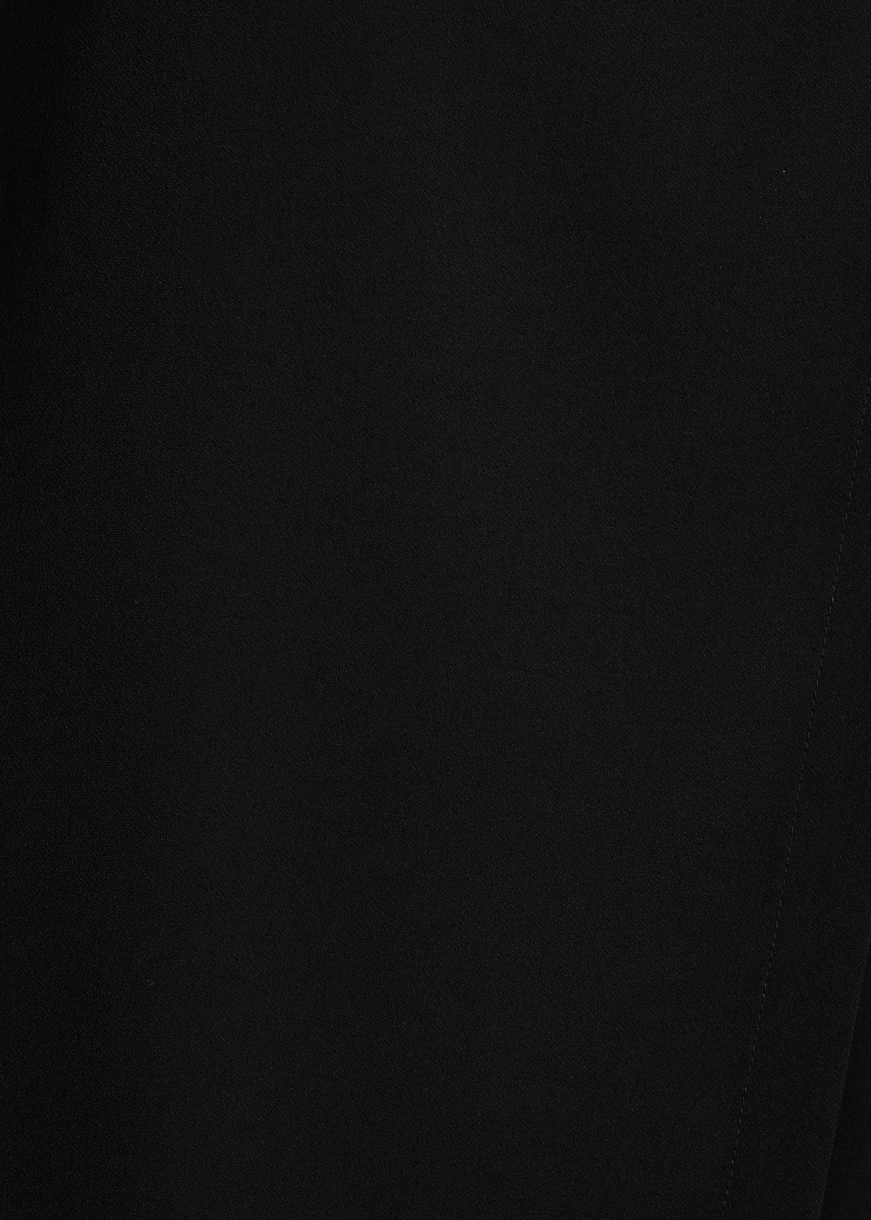 Pantalon noir large avec pan à taille haute