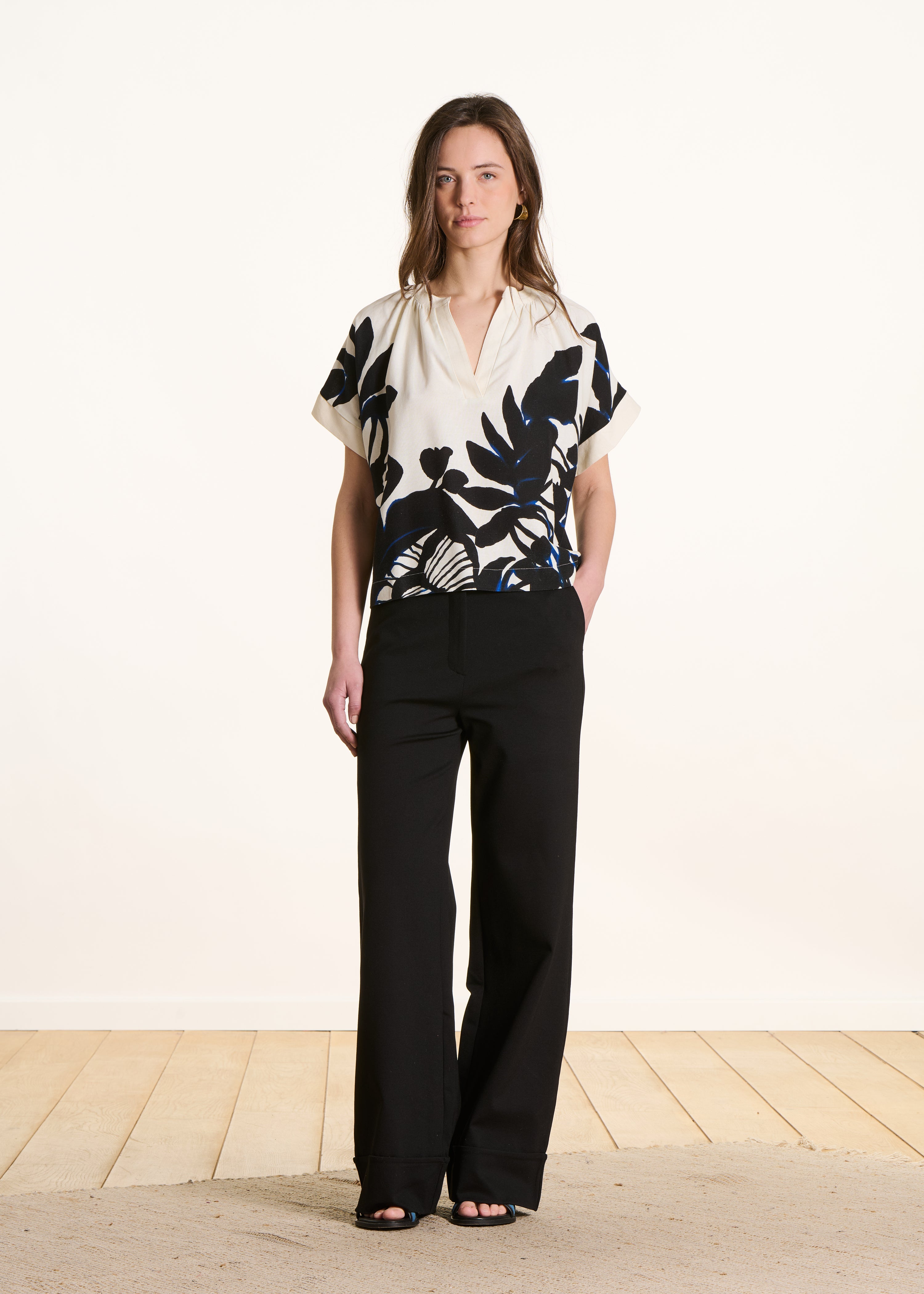 High-waisted black milano trousers