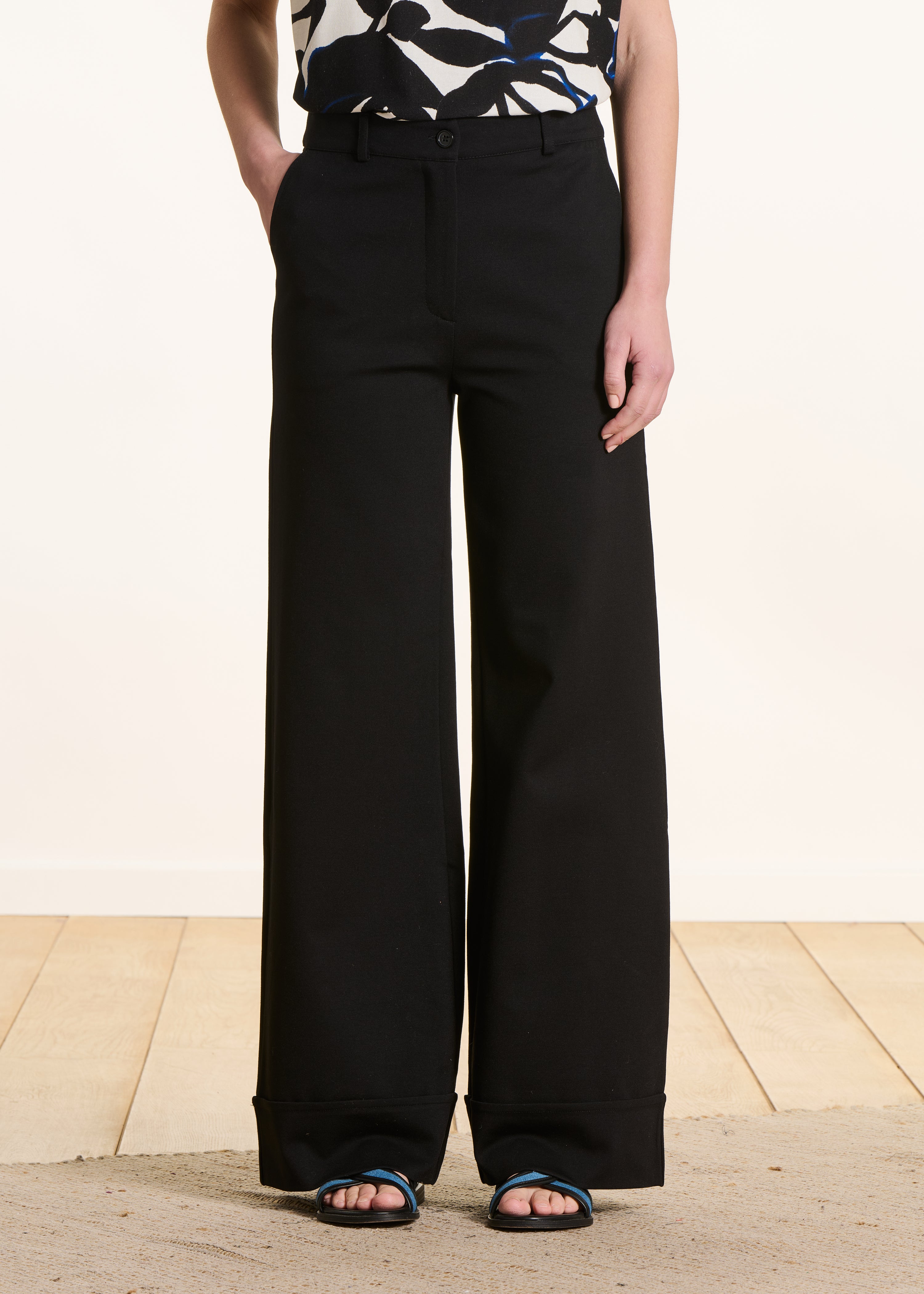 High-waisted black milano trousers