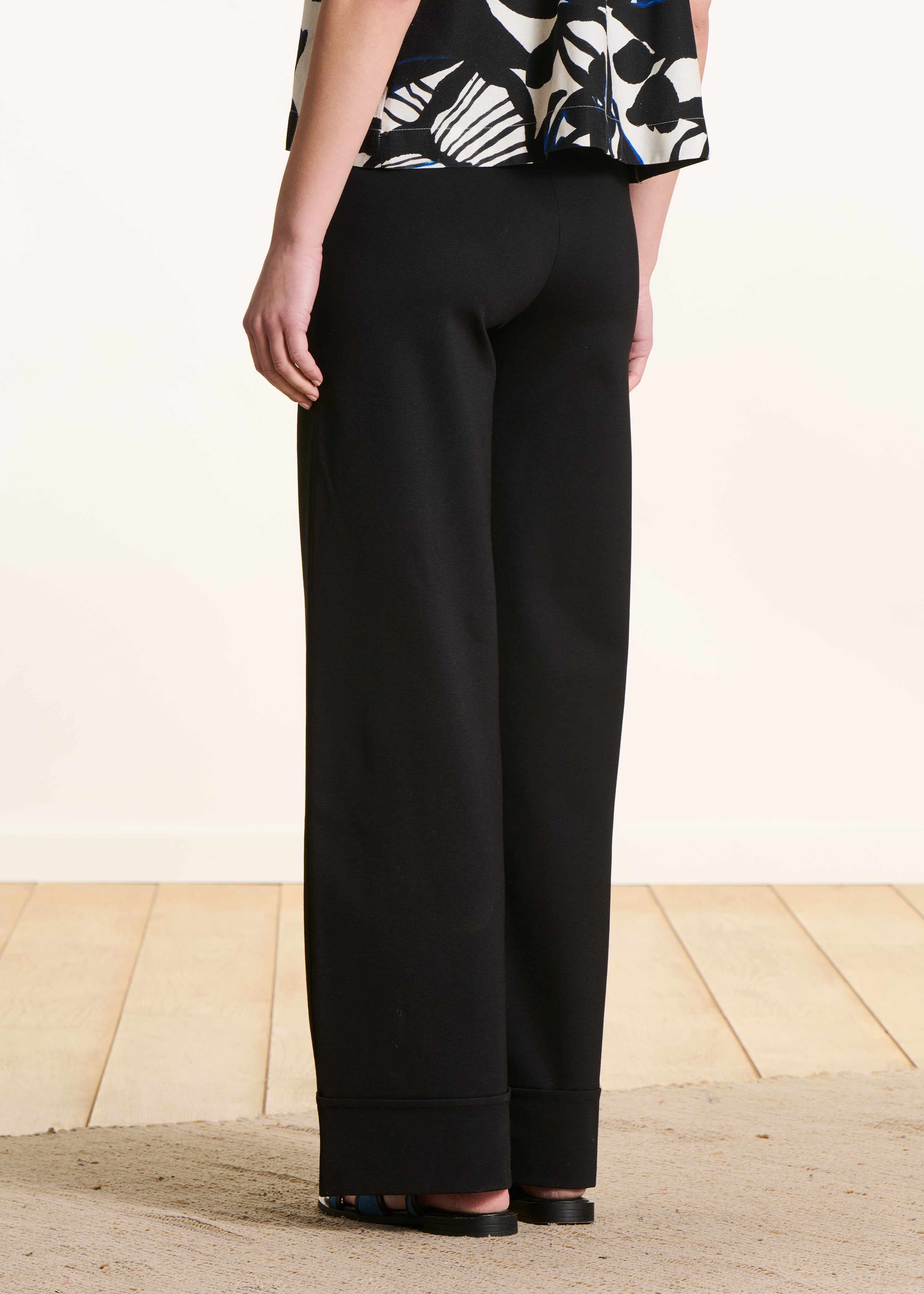 High-waisted black milano trousers