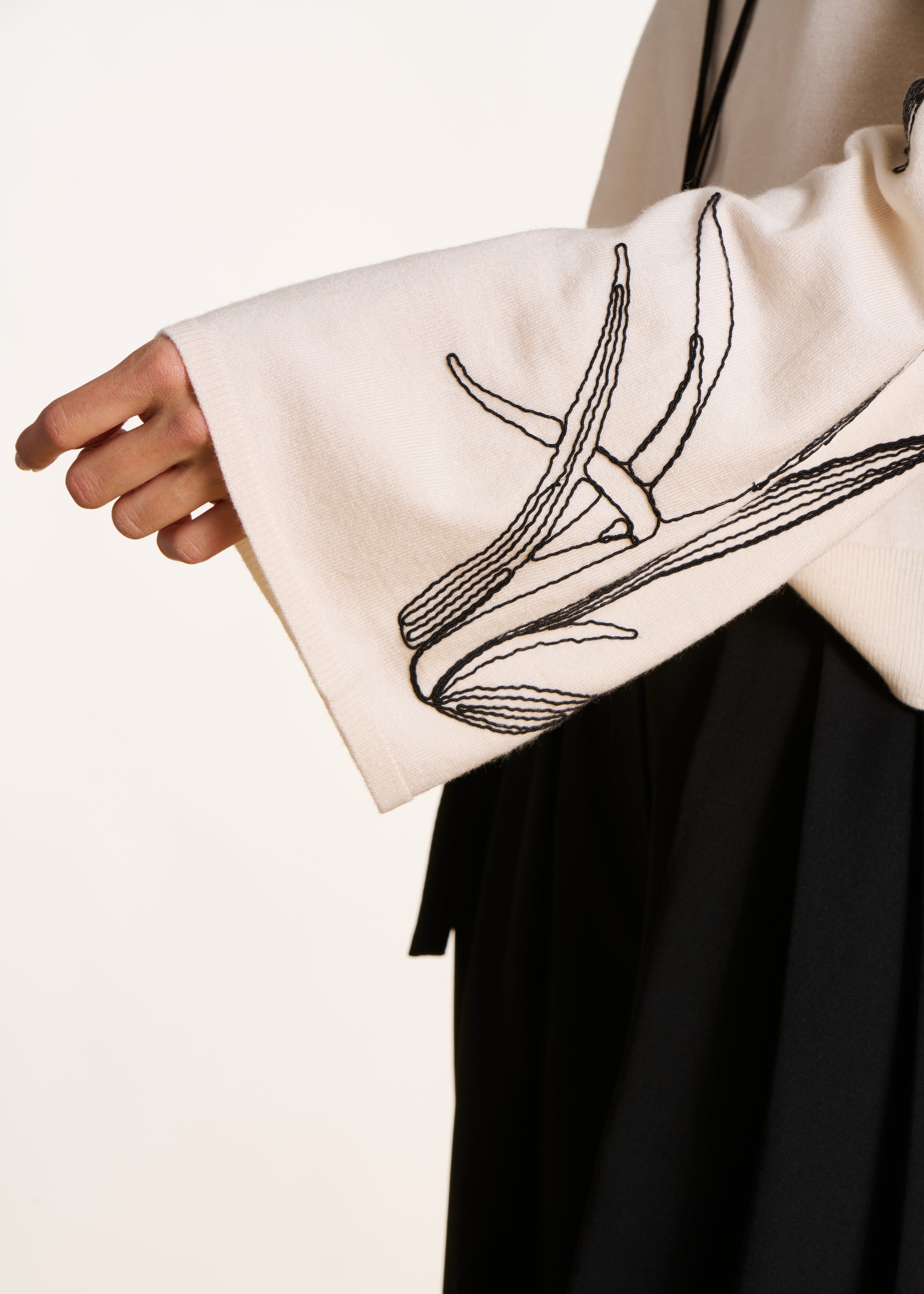 Ecru sweater with embroidery long sleeves