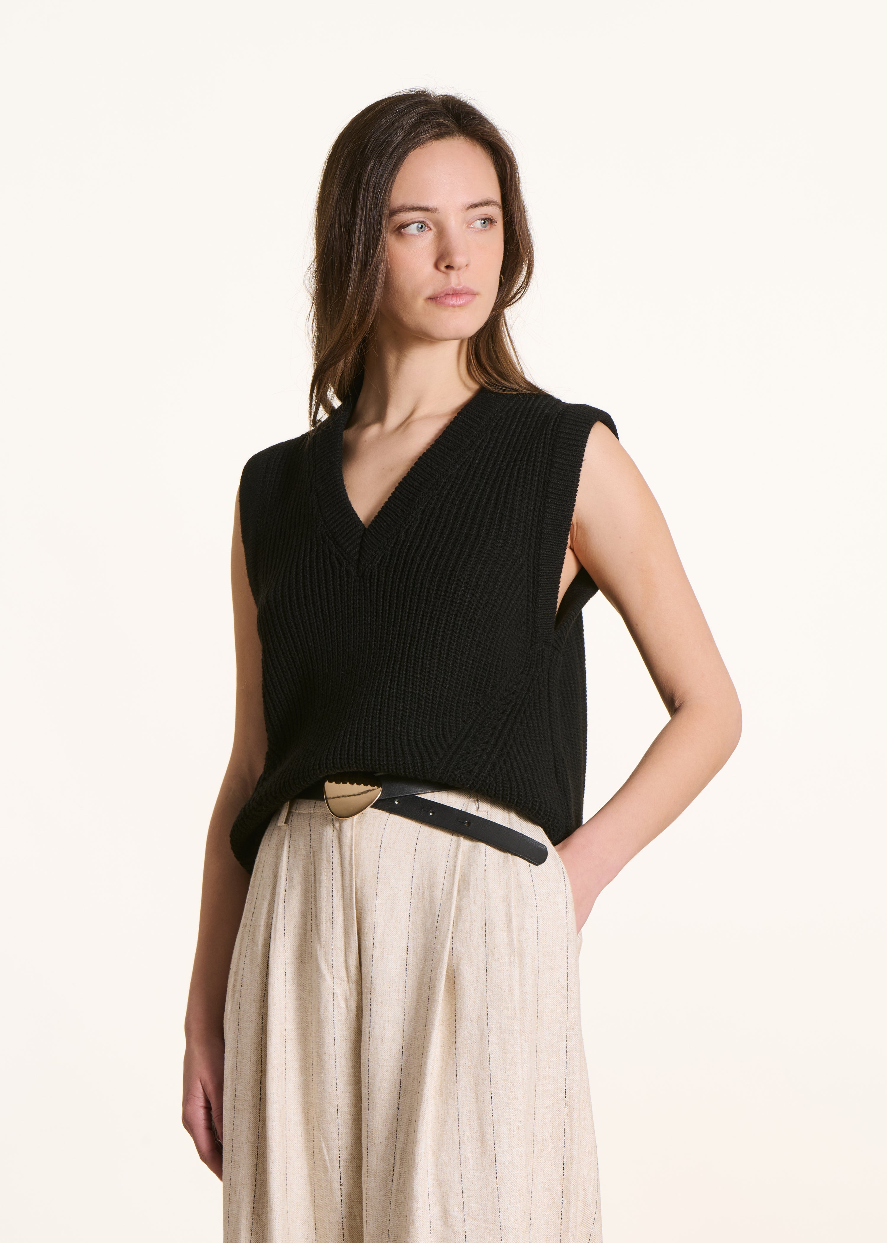 black sleeveless V-neck jumper