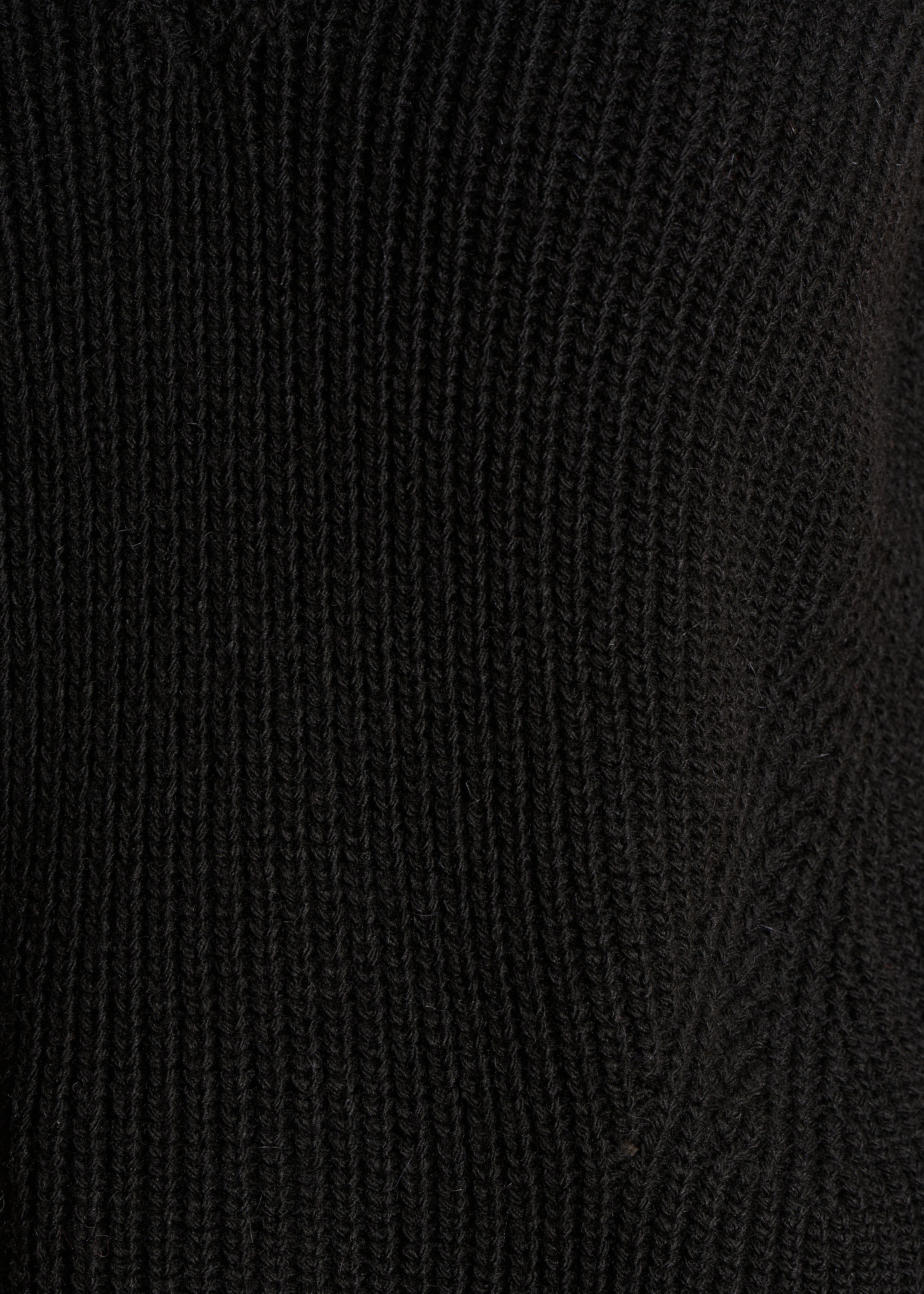 black sleeveless V-neck jumper