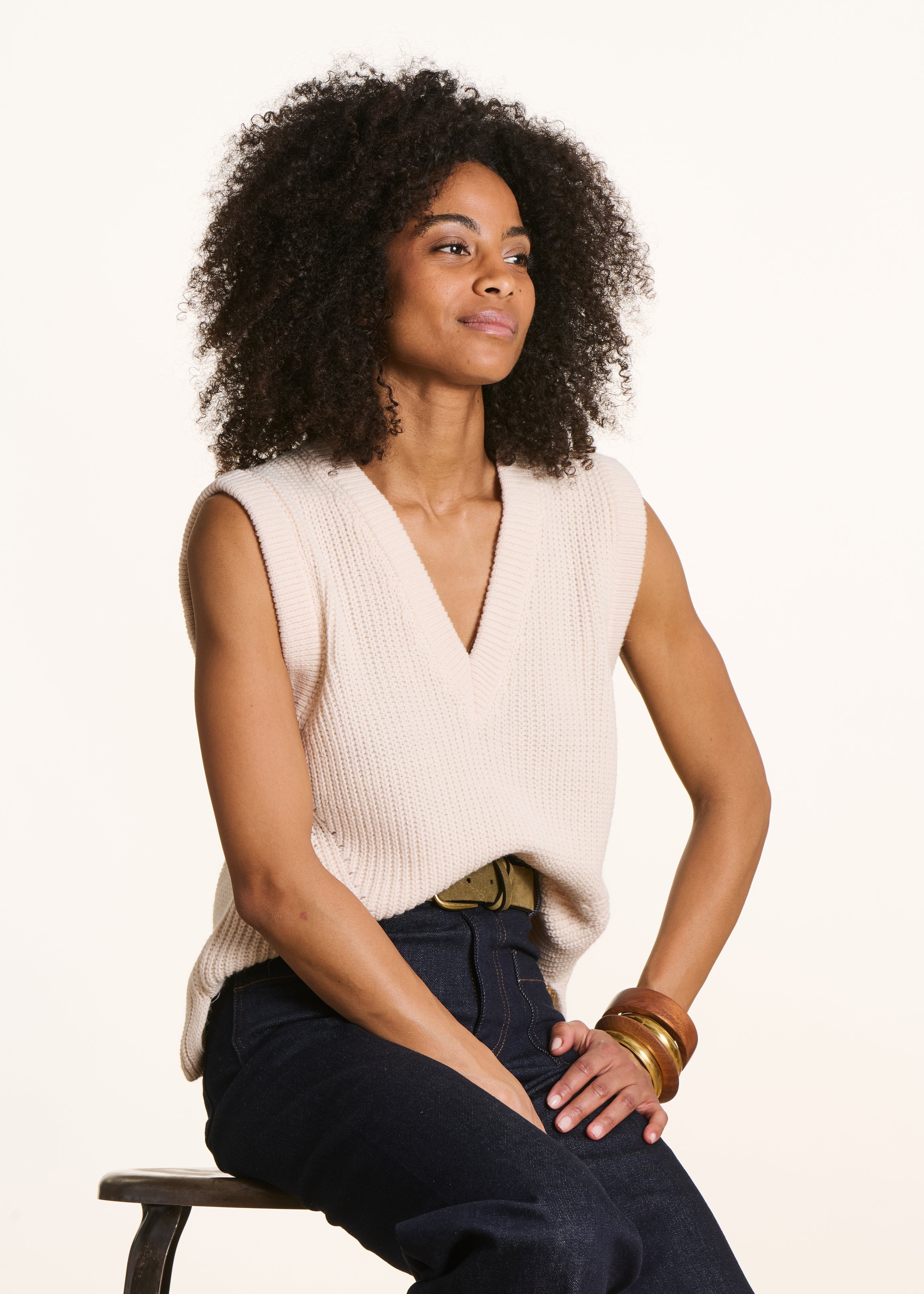 Off-white sleeveless V-neck jumper
