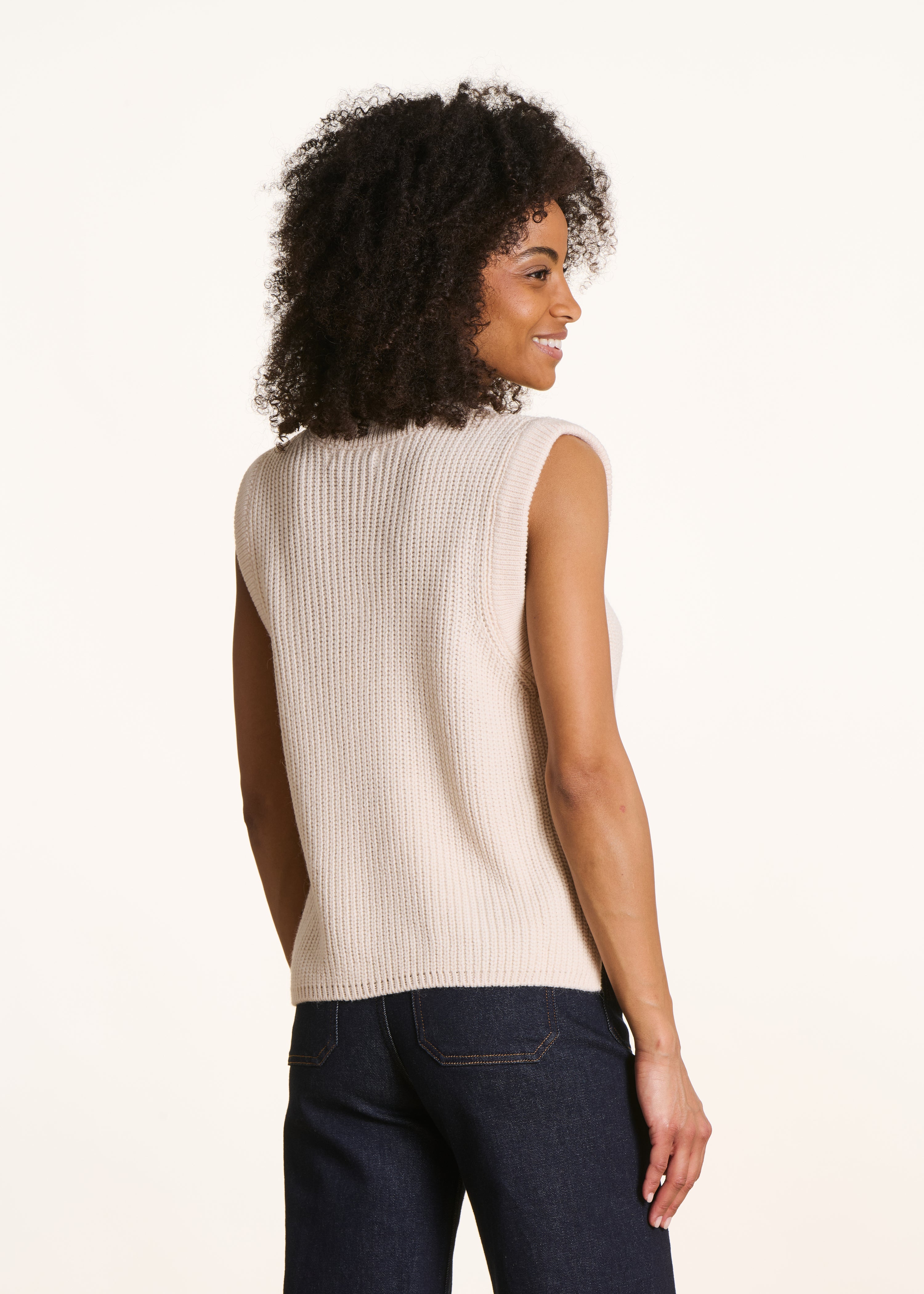 Off-white sleeveless V-neck jumper