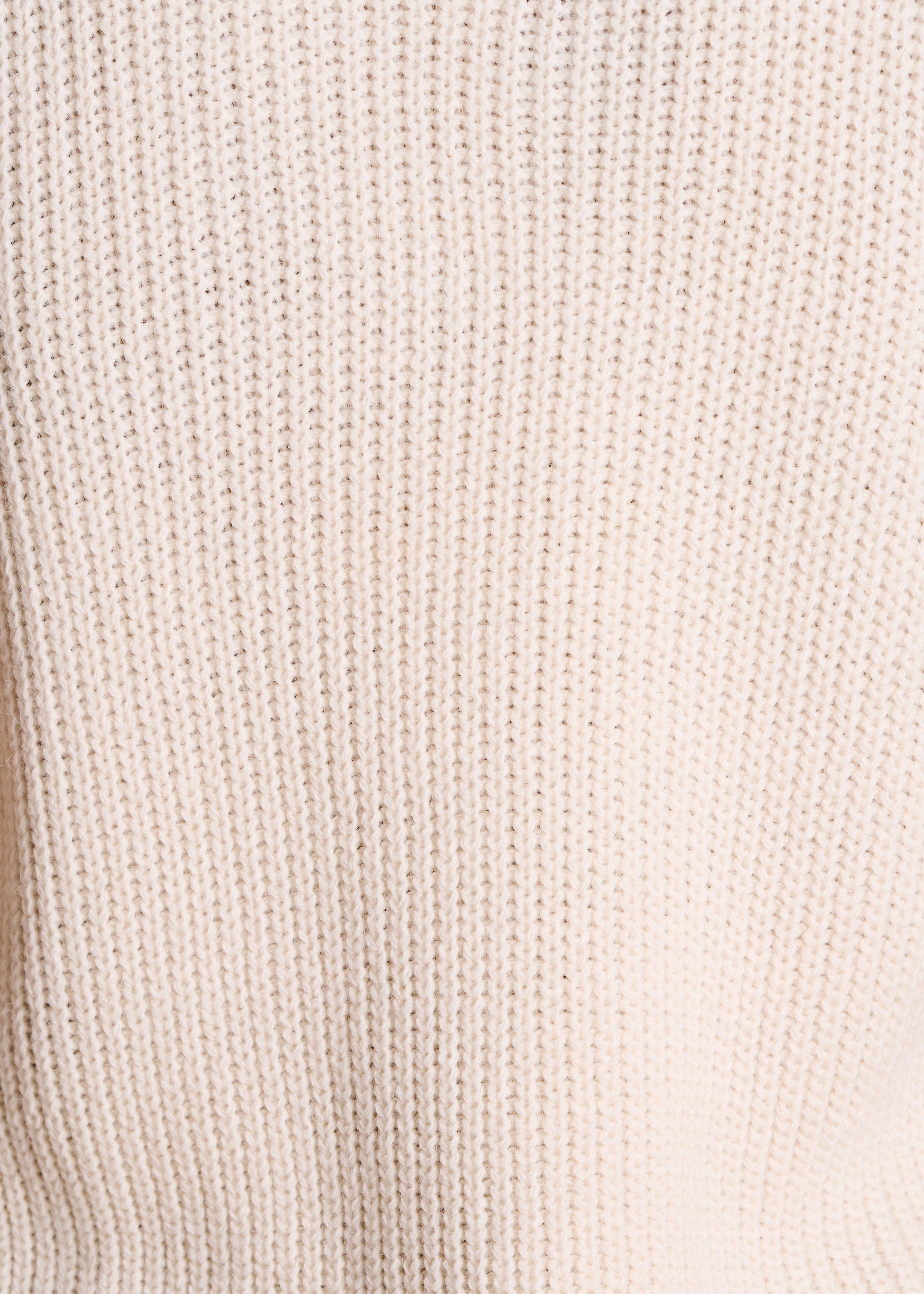 Off-white sleeveless V-neck jumper
