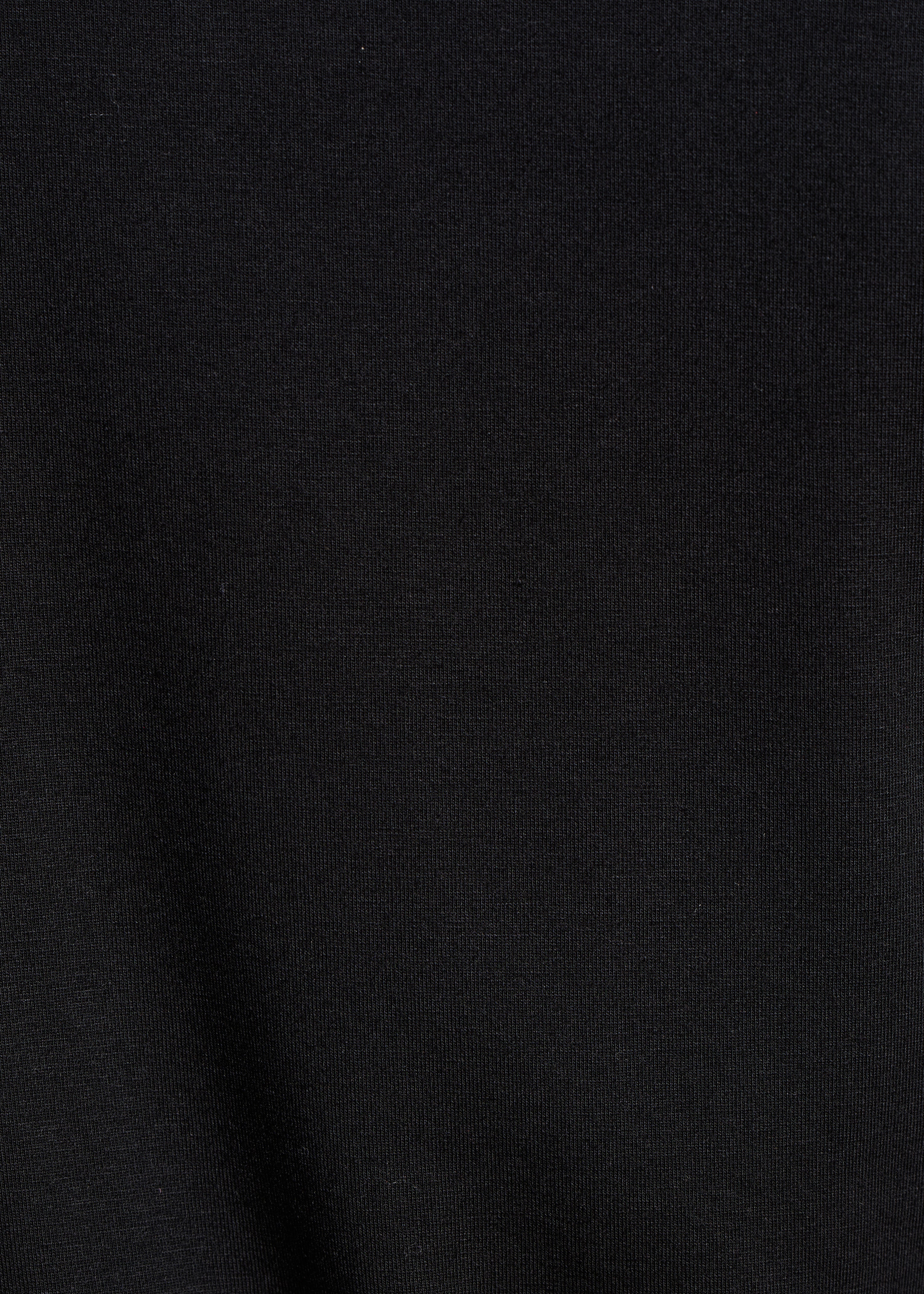 Camiseta negra holgada de manga larga en modal