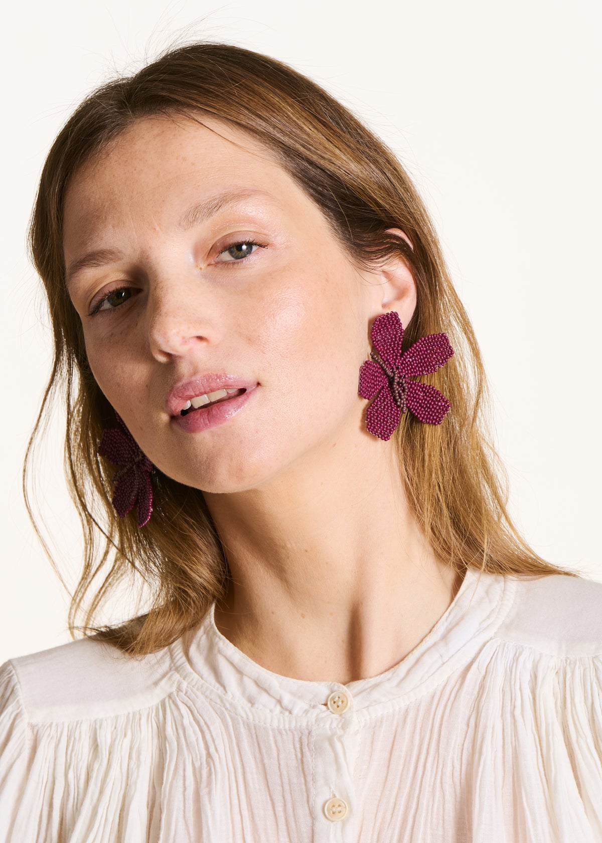 Flower earrings with purple pearls