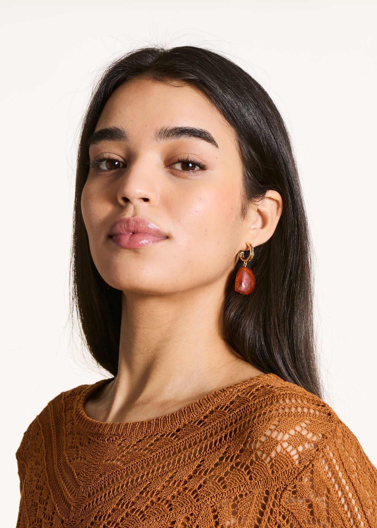Gold and brown dangling earrings