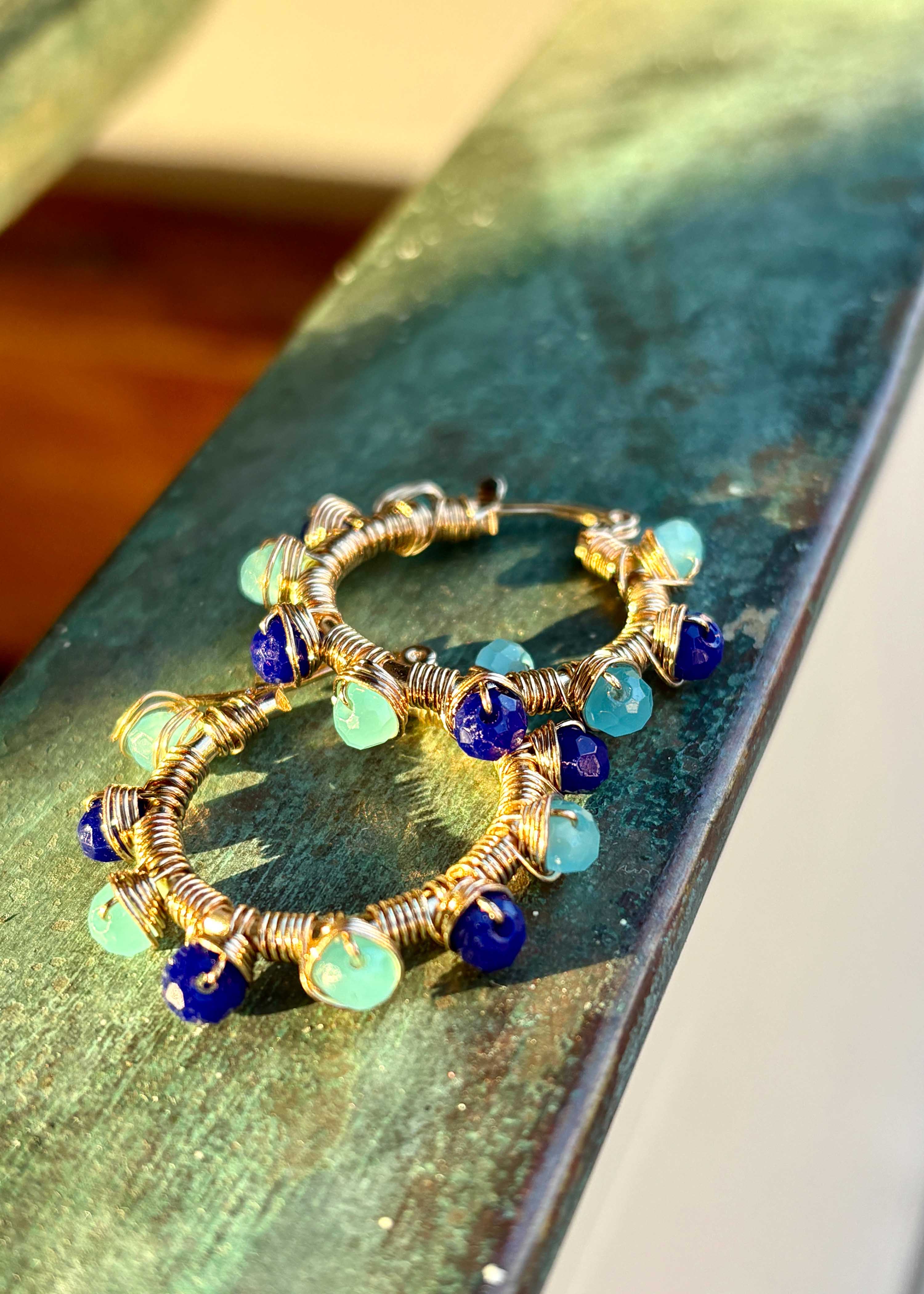 Pendientes de aro con perlas azules