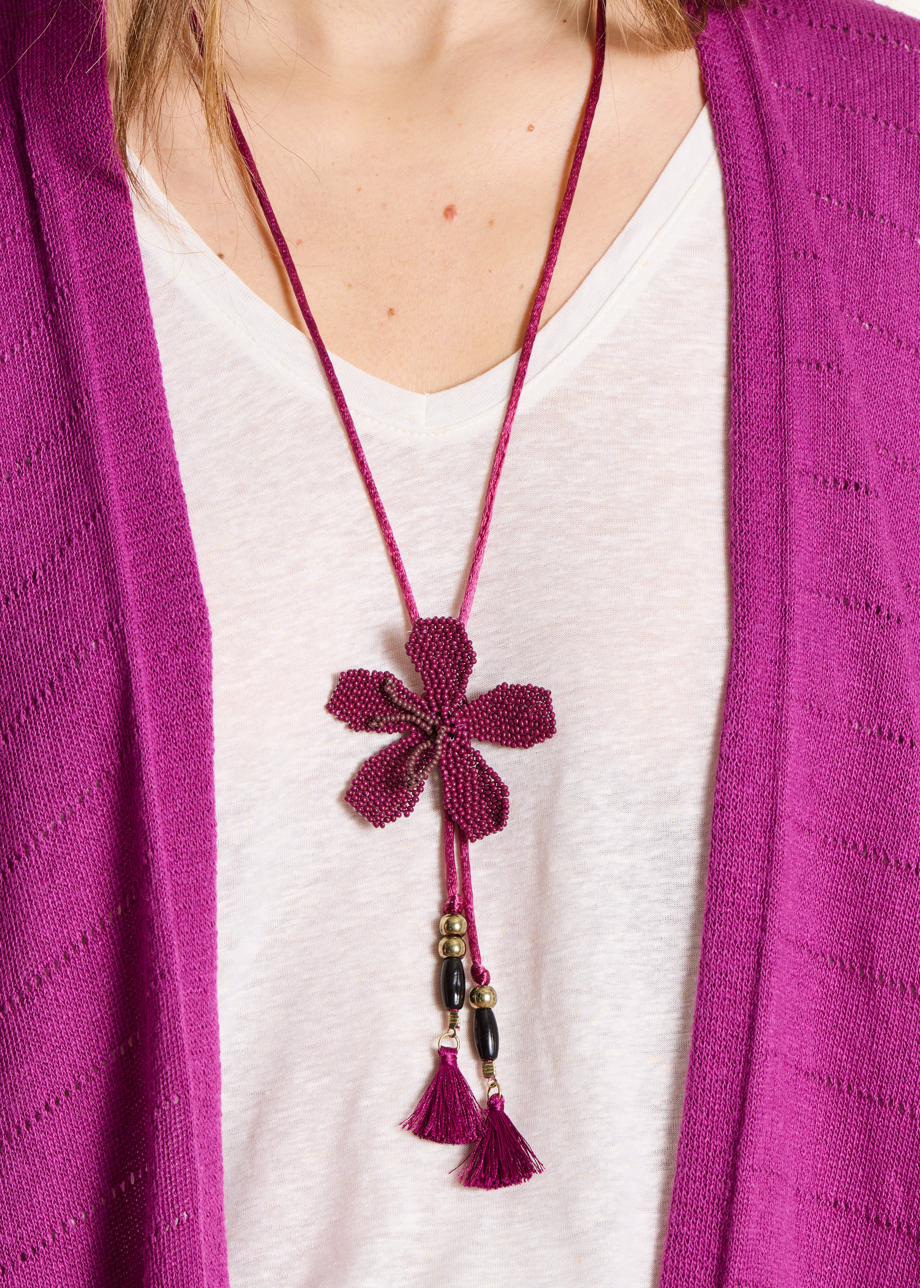Long necklace with purple glass bead flower