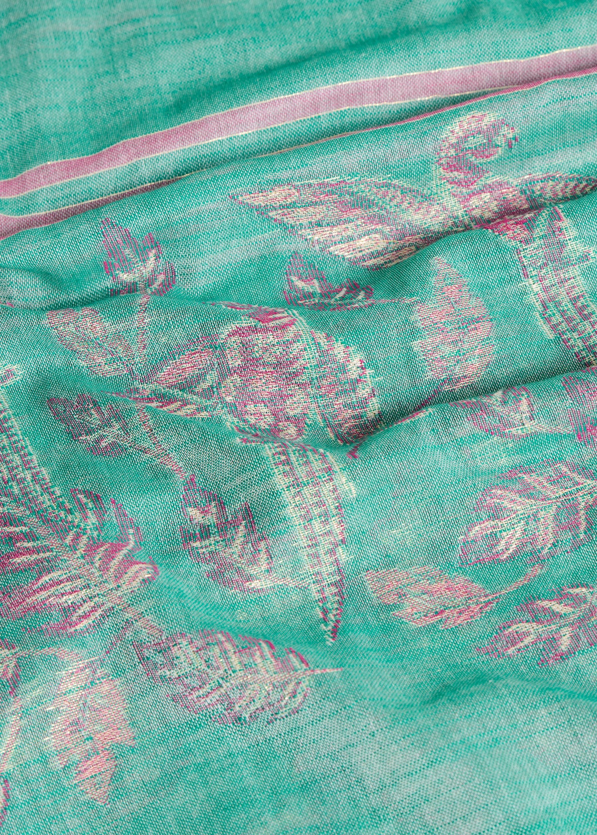 Green scarf with leaf pattern