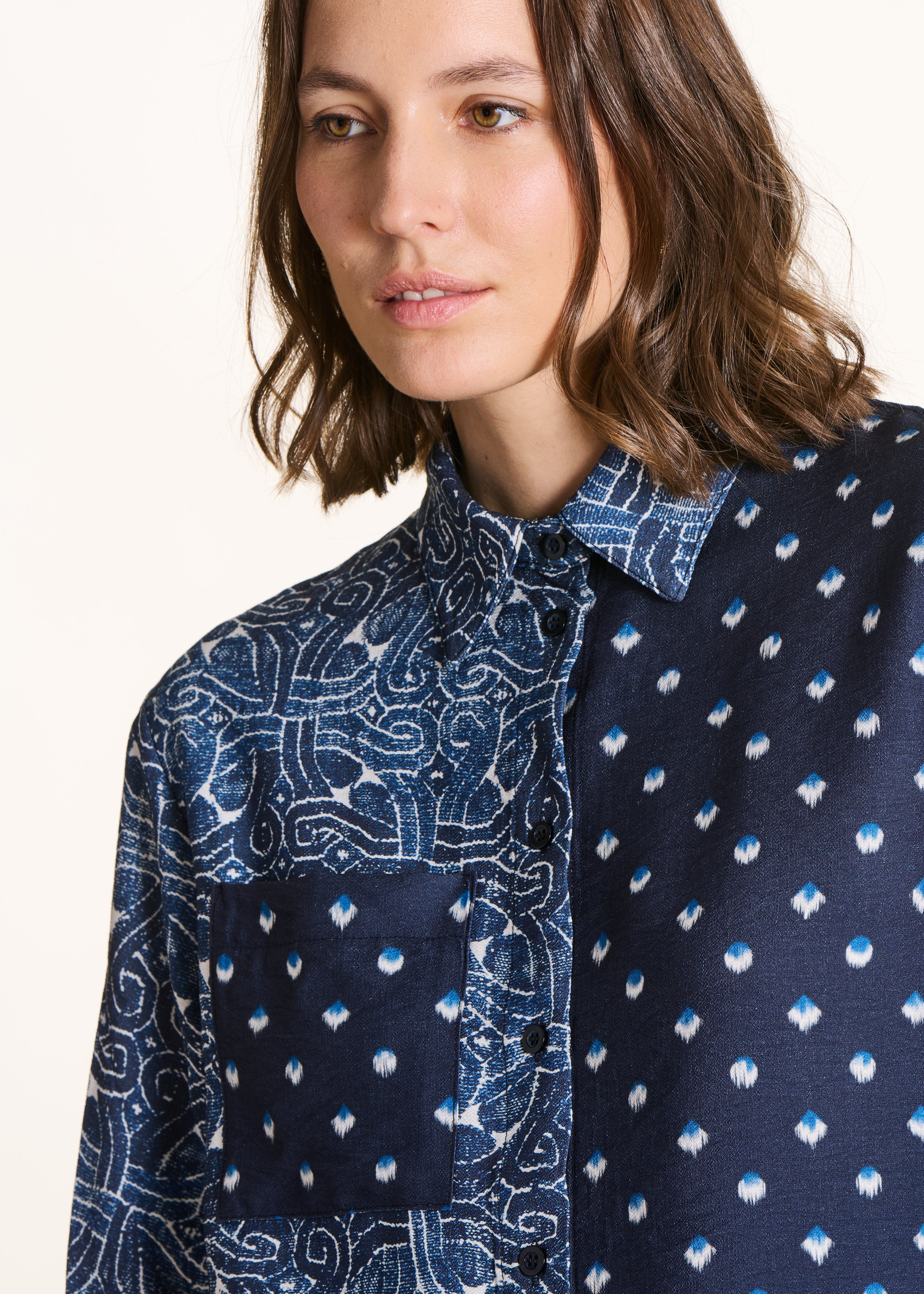 Blue long-sleeve shirt with printed patchwork