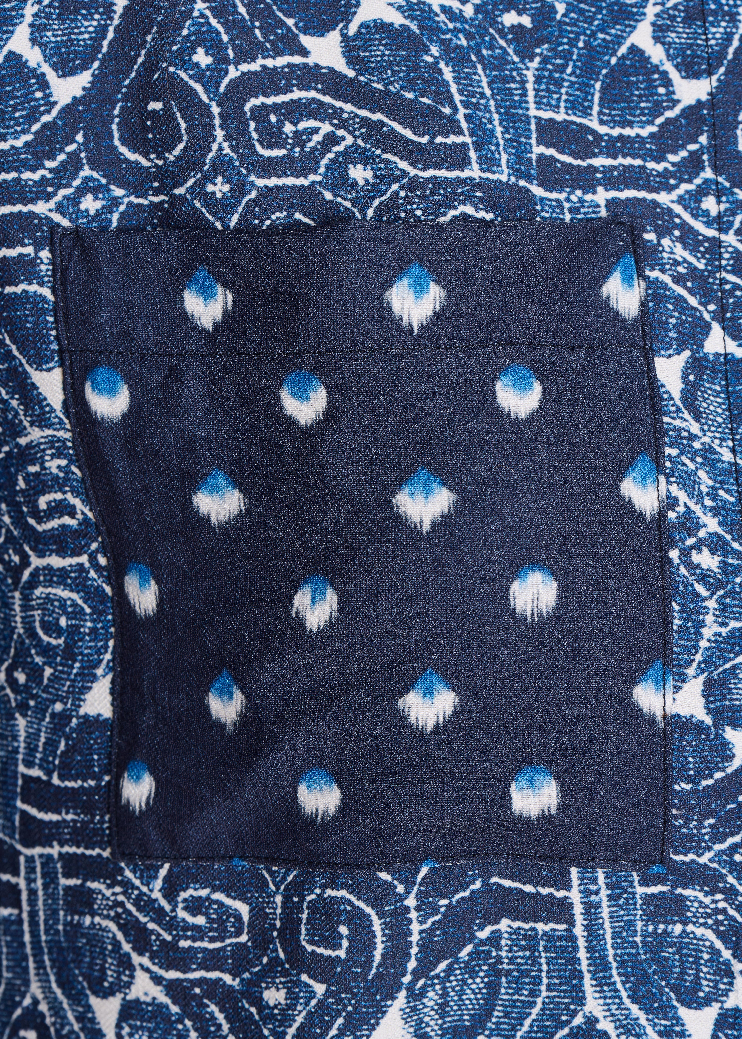 Blue long-sleeve shirt with printed patchwork
