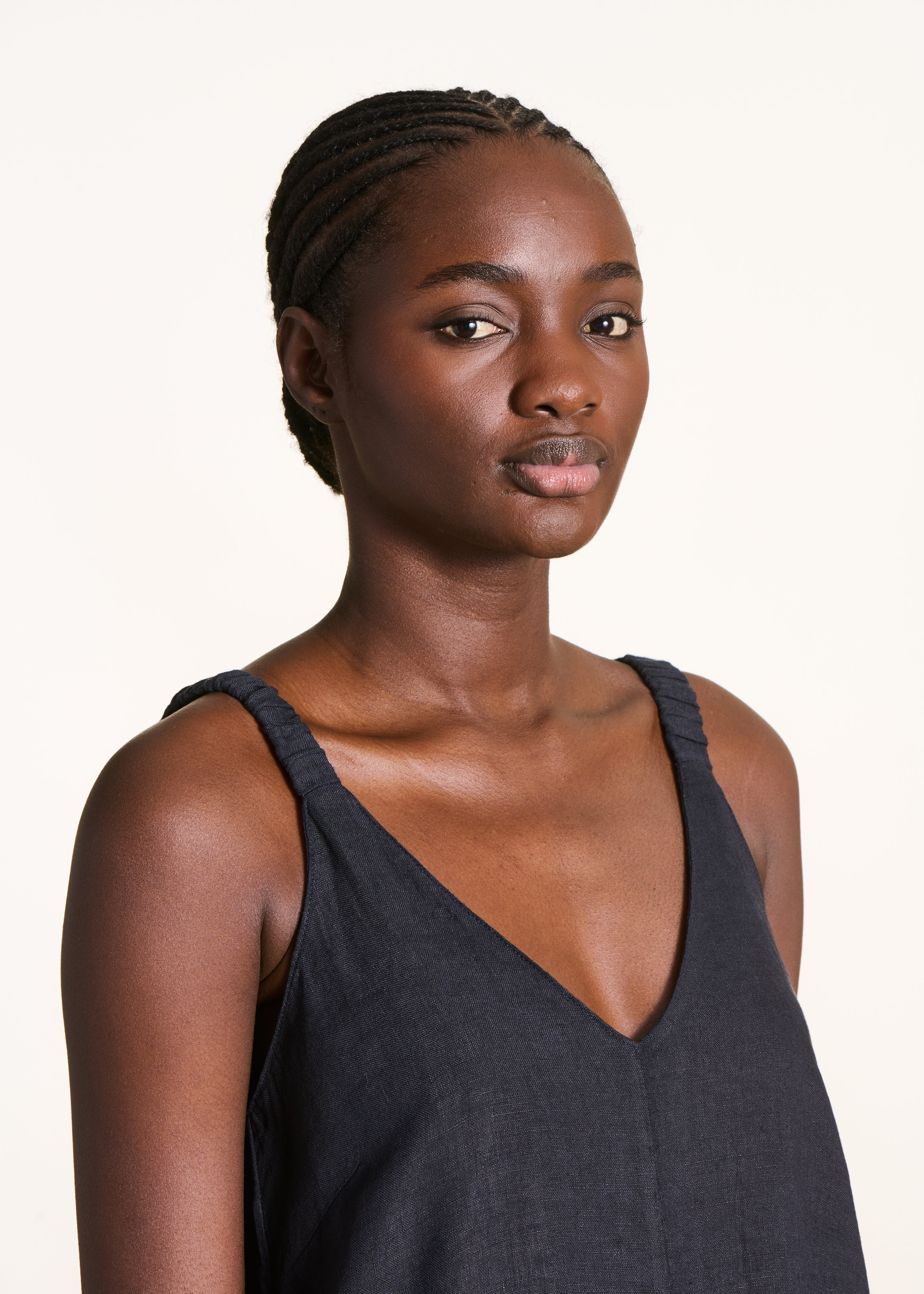 Dark blue linen jumpsuit with elastic straps