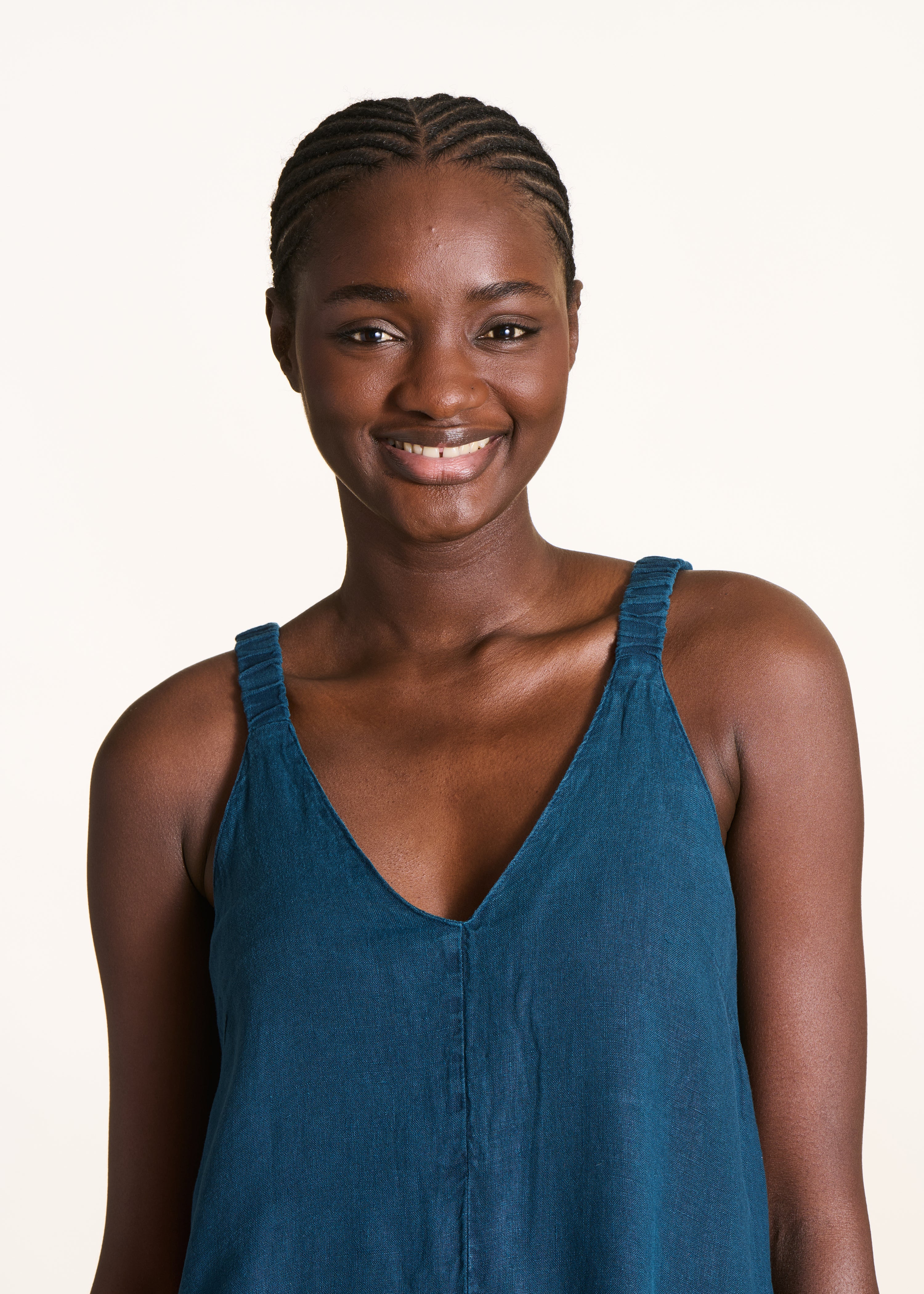 Petrol blue linen jumpsuit with elastic straps