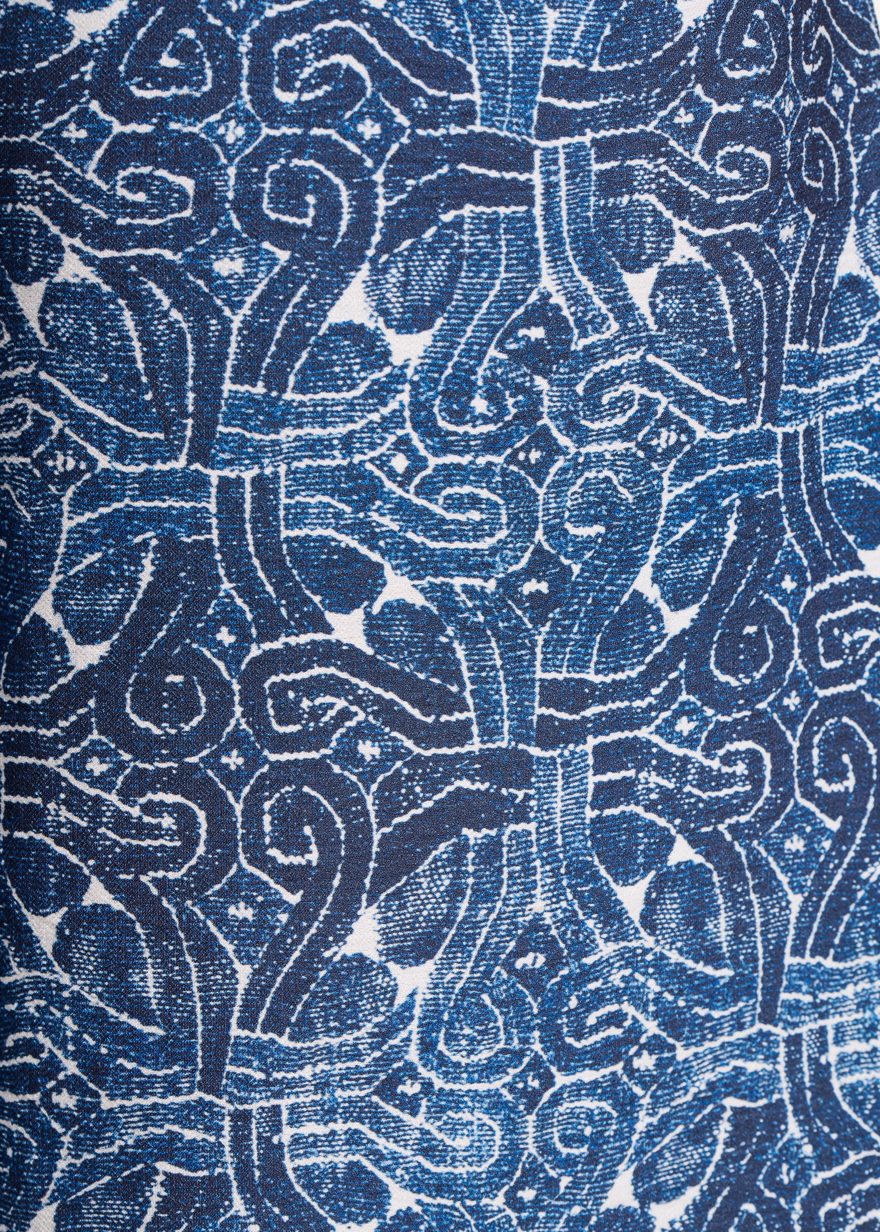 Mono azul de manga corta con estampado