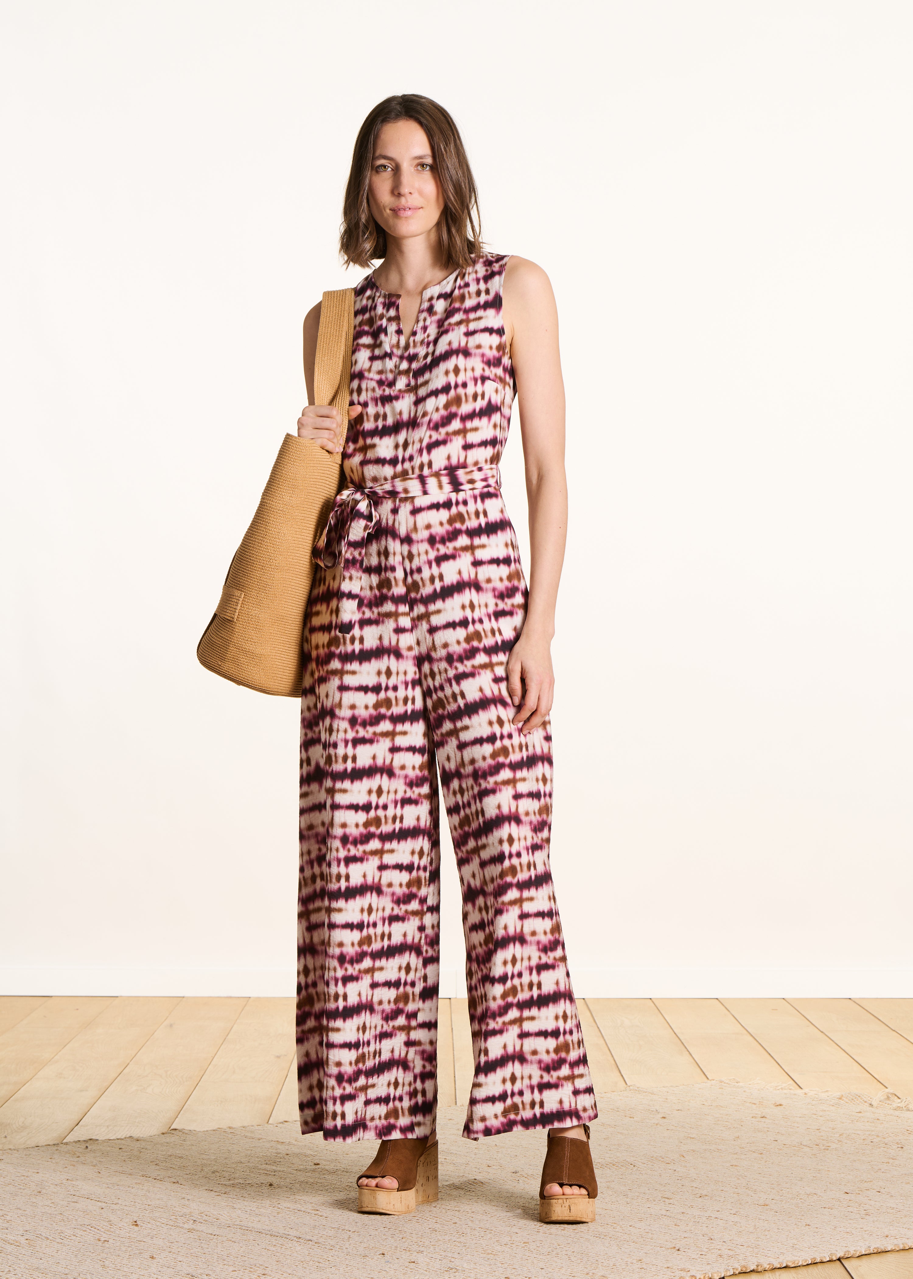 Tuta pantalone con stampa tie & dye bordeaux
