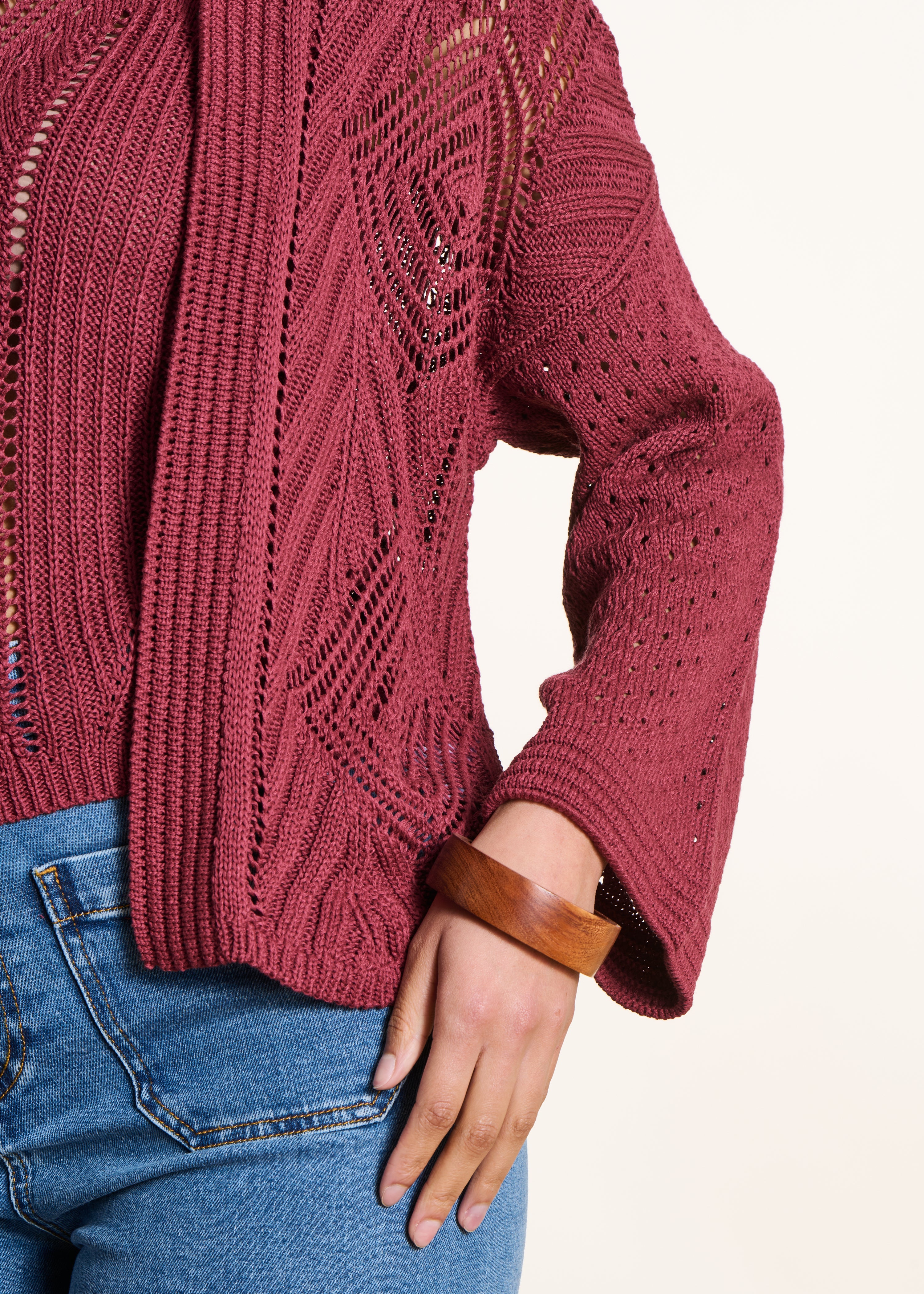 Open burgundy vest in openwork crochet knit