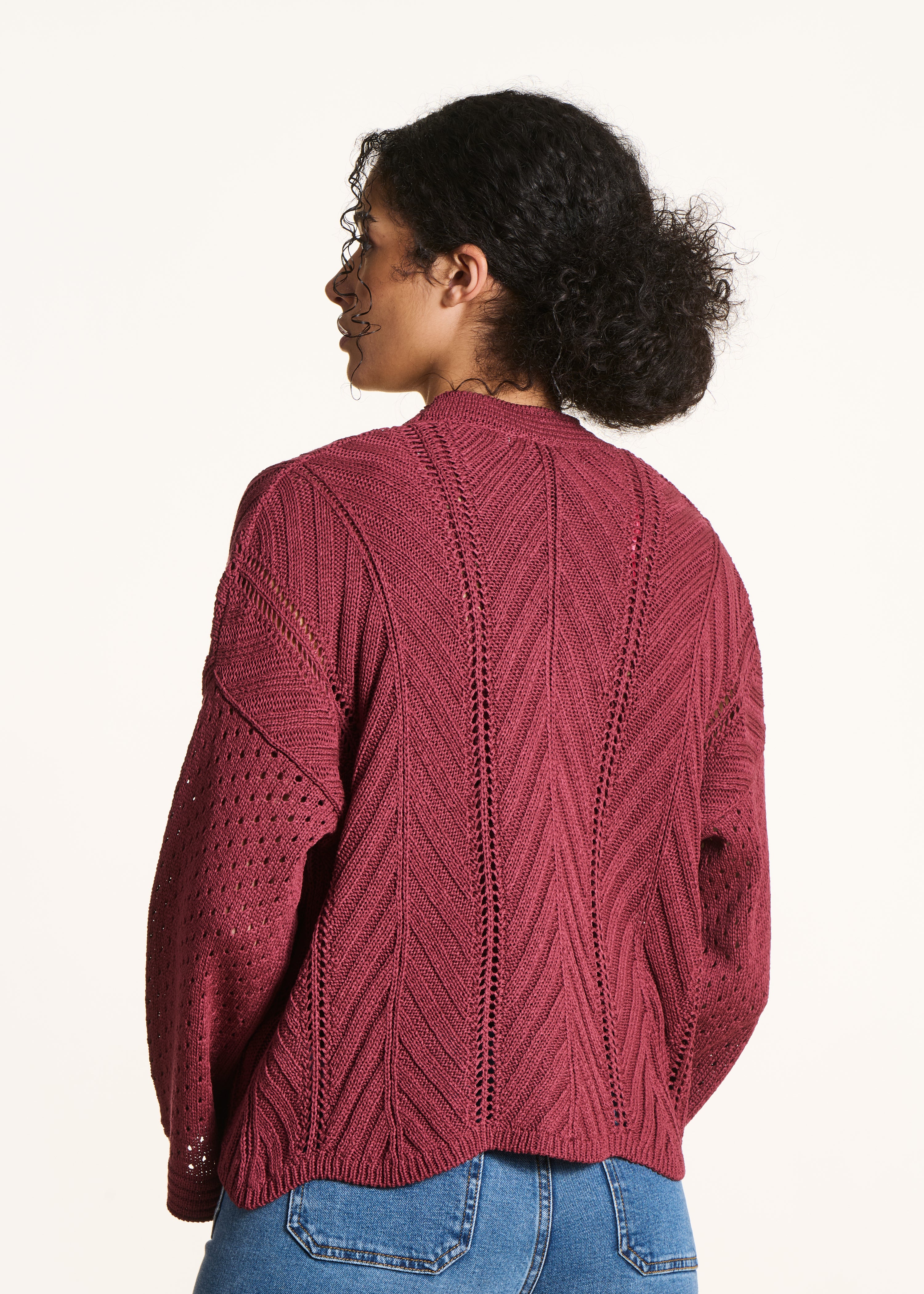 Open burgundy vest in openwork crochet knit