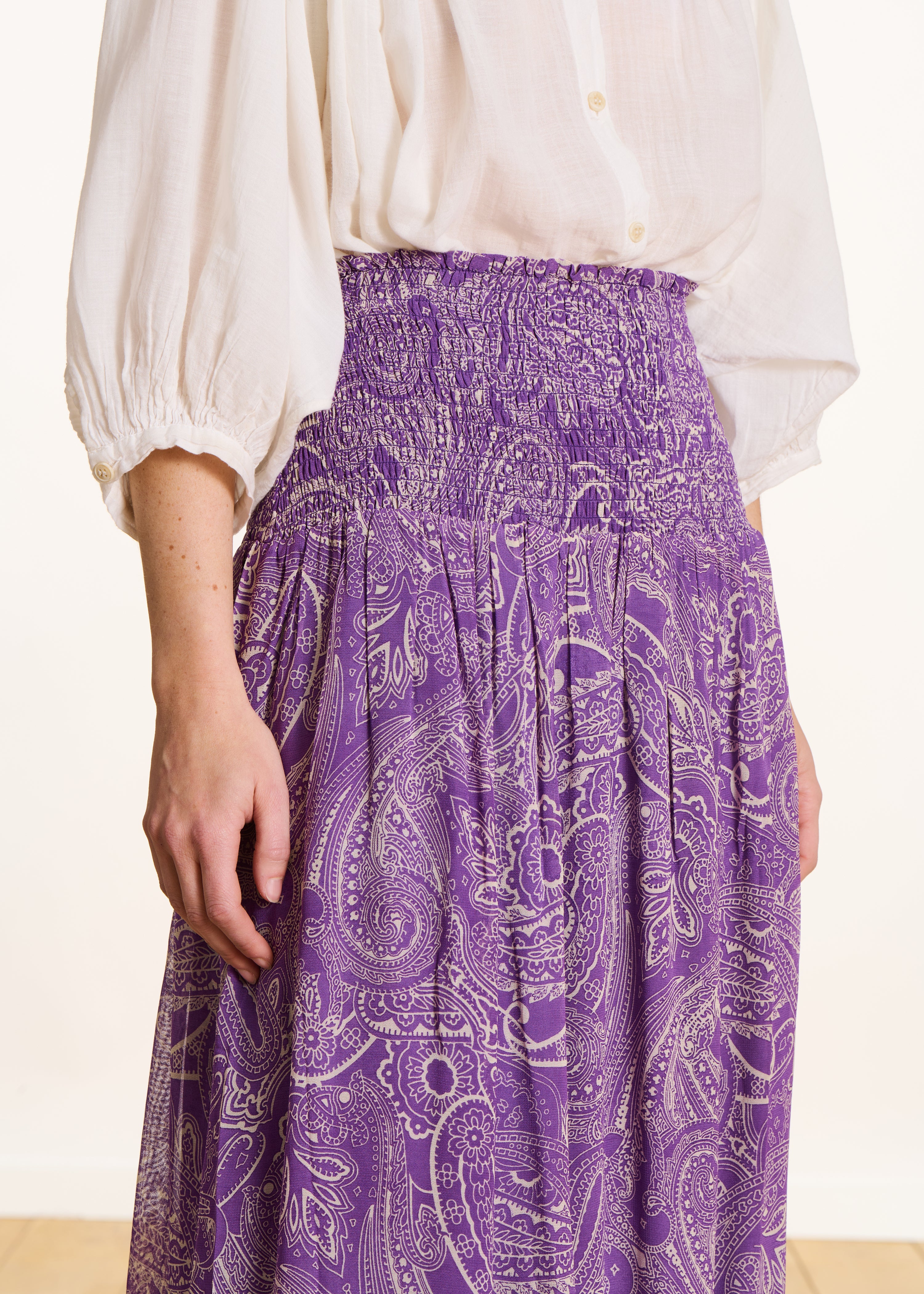 Long purple voile skirt with print and smocking
