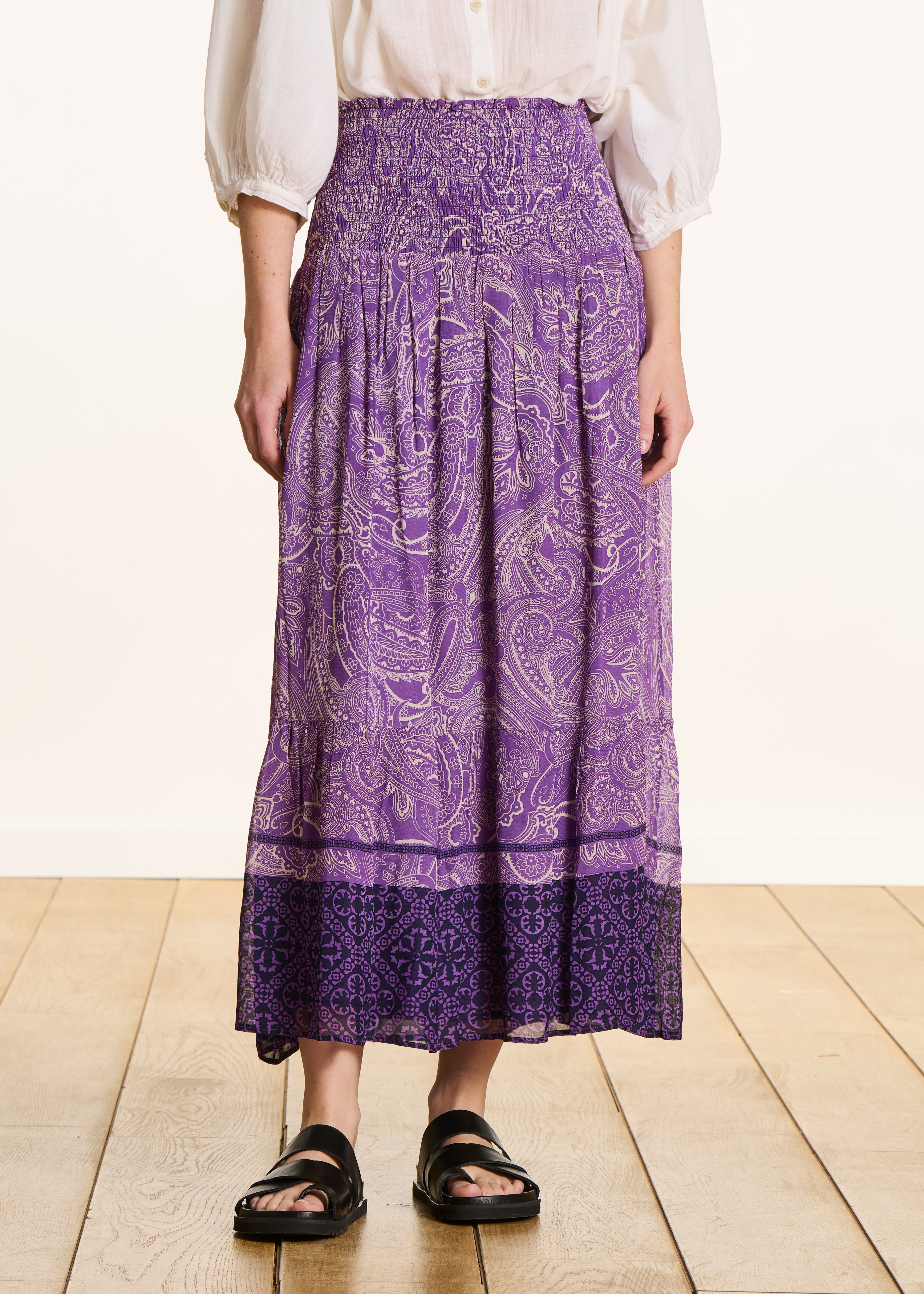 Long purple voile skirt with print and smocking